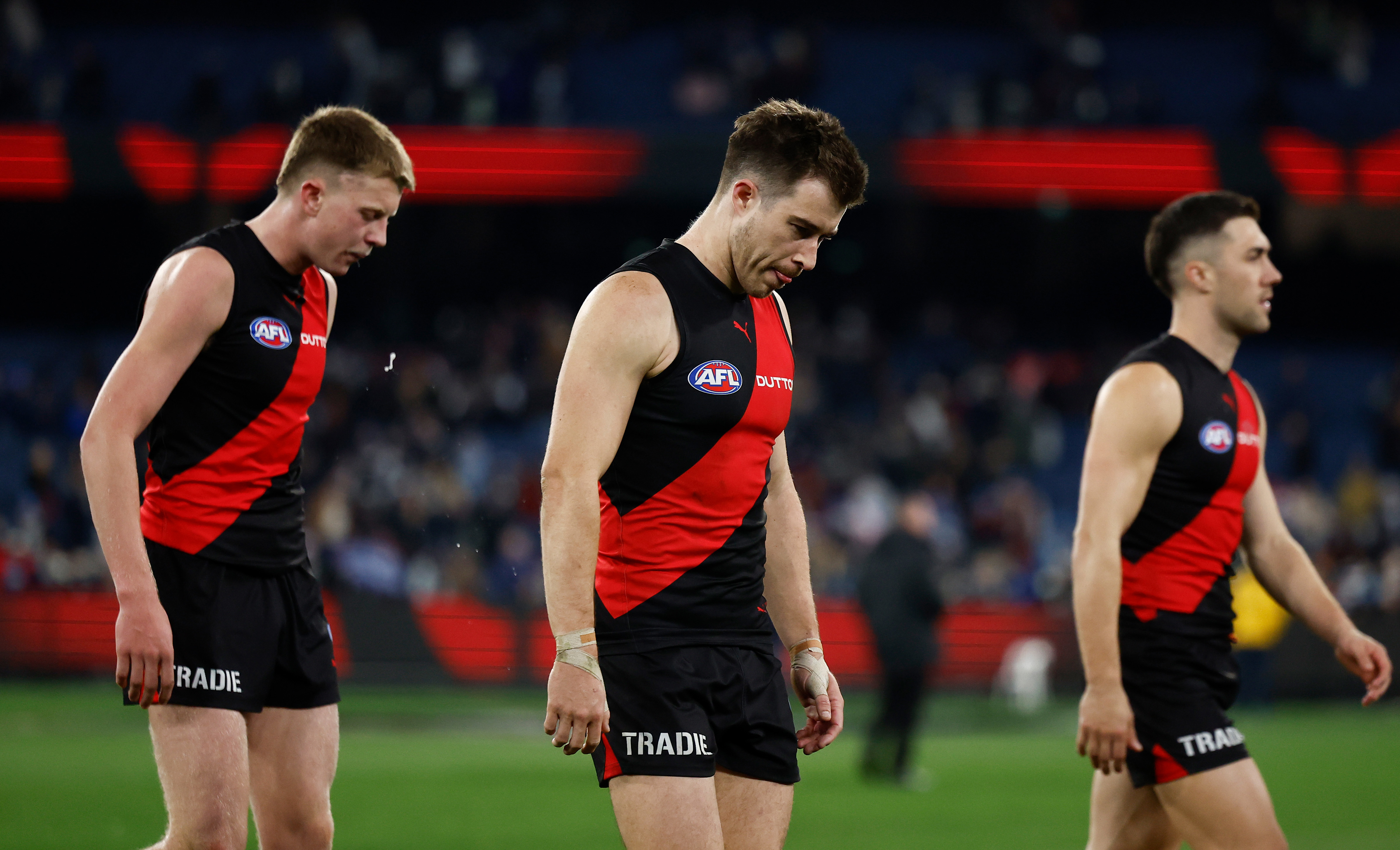 Zach Merrett of the Bombers looks dejected after a loss.