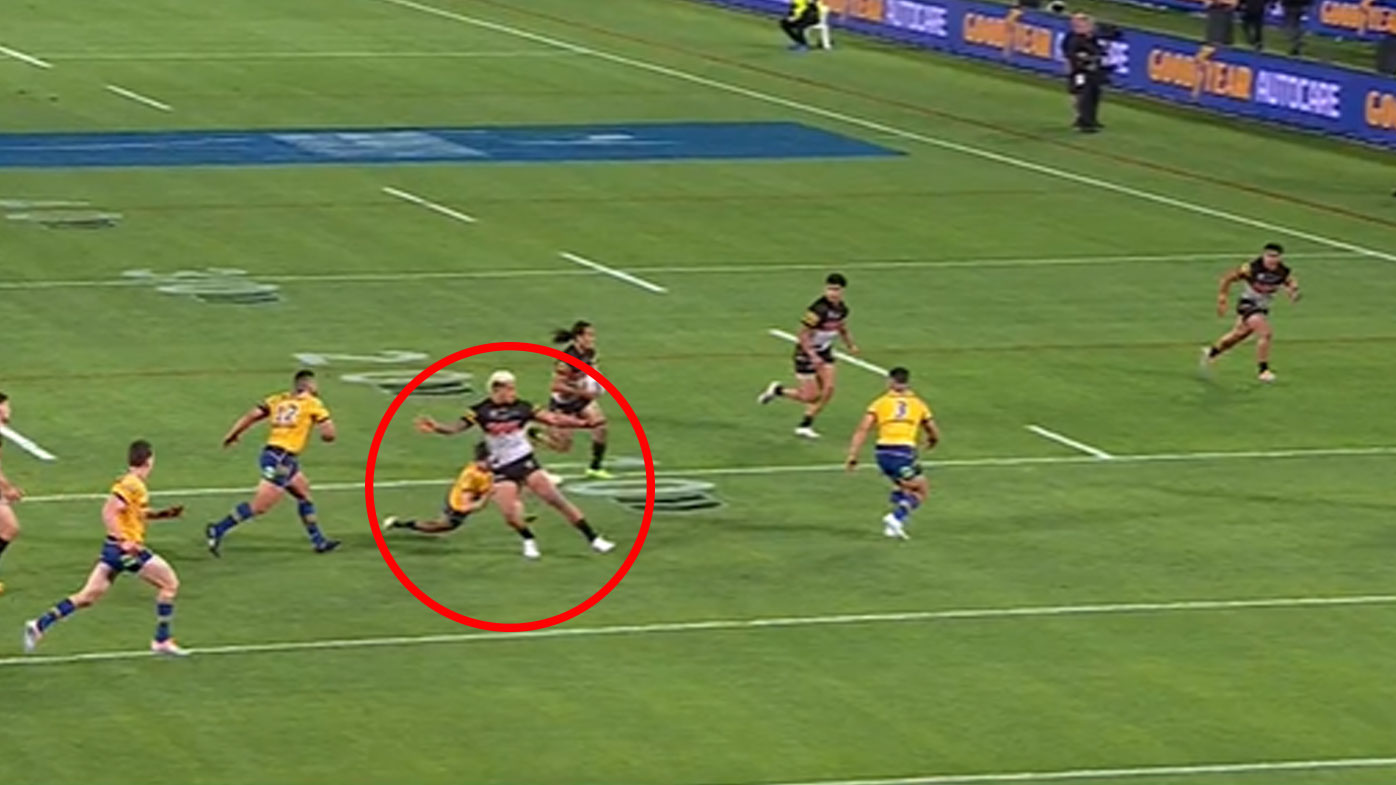 Viliame Kikau bowled over Mitchell Moses as Jarome Luai proceeded to swing the ball to the left side of the field