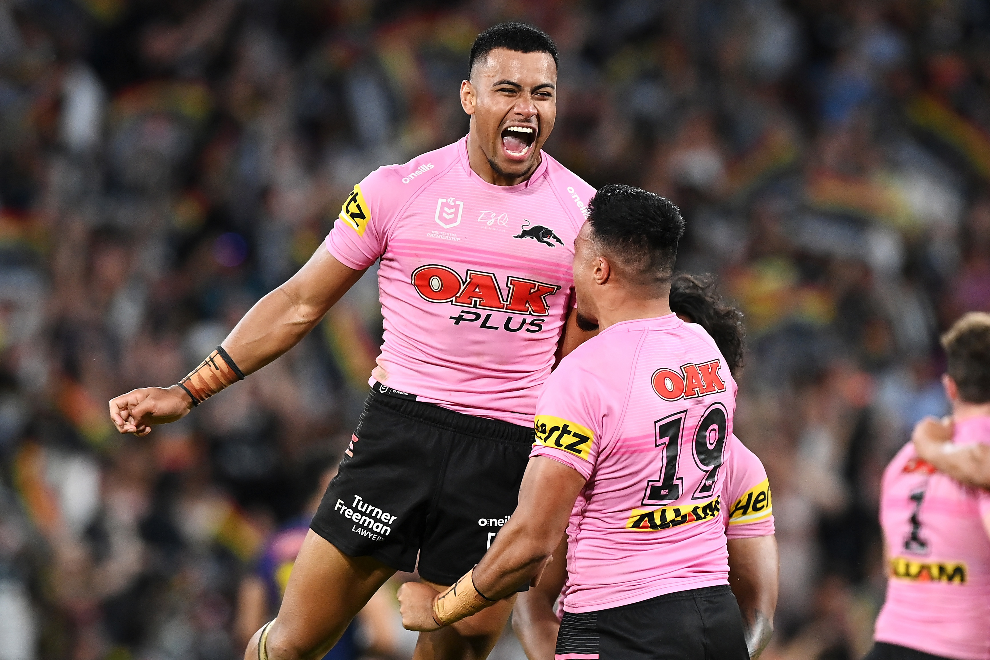 Spencer Leniu and Stephen Crichton celebrate victory. Penrith Panthers.