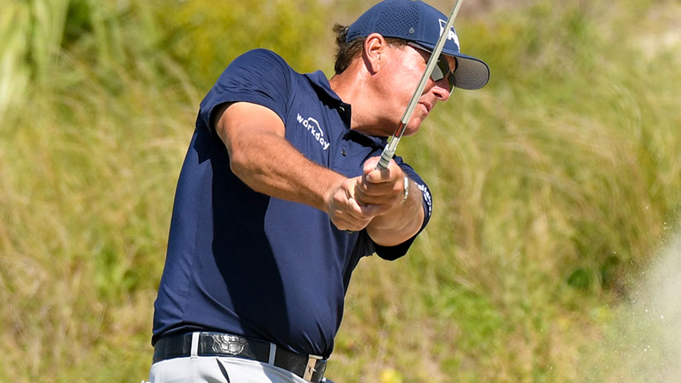 Phil Mickelson hits out of a bunker on the fifth hole during the final round of the 2021 PGA Championship.