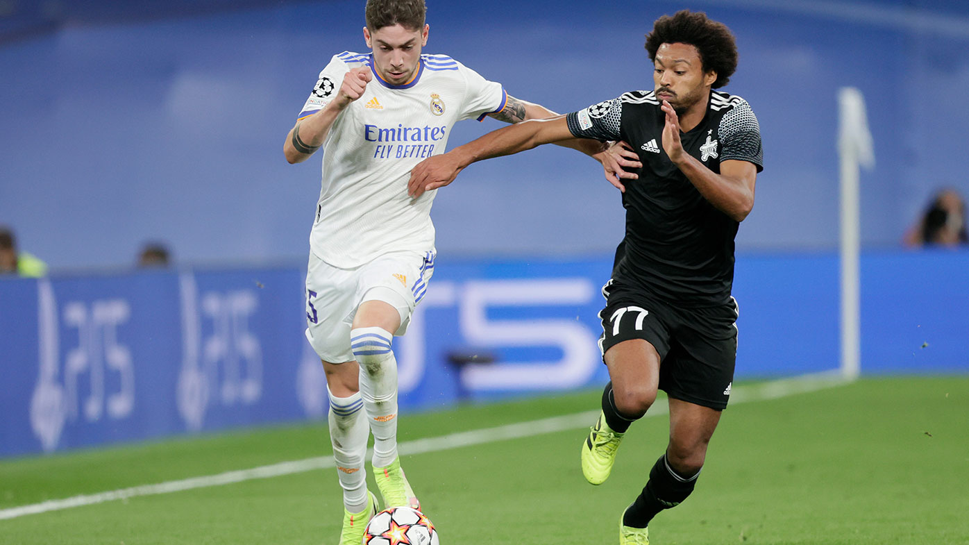  (L-R) Fede Valverde of Real Madrid, Bruno Felipe Souza da Silva of FC Sheriff Tiraspol during the UEFA Champions League match between Real Madrid v FC Sheriff Tiraspol at the Estadio Alfredo Di Stefano on September 28, 2021 in Madrid Spain (Photo by David S. Bustamante/Soccrates/Getty Images)