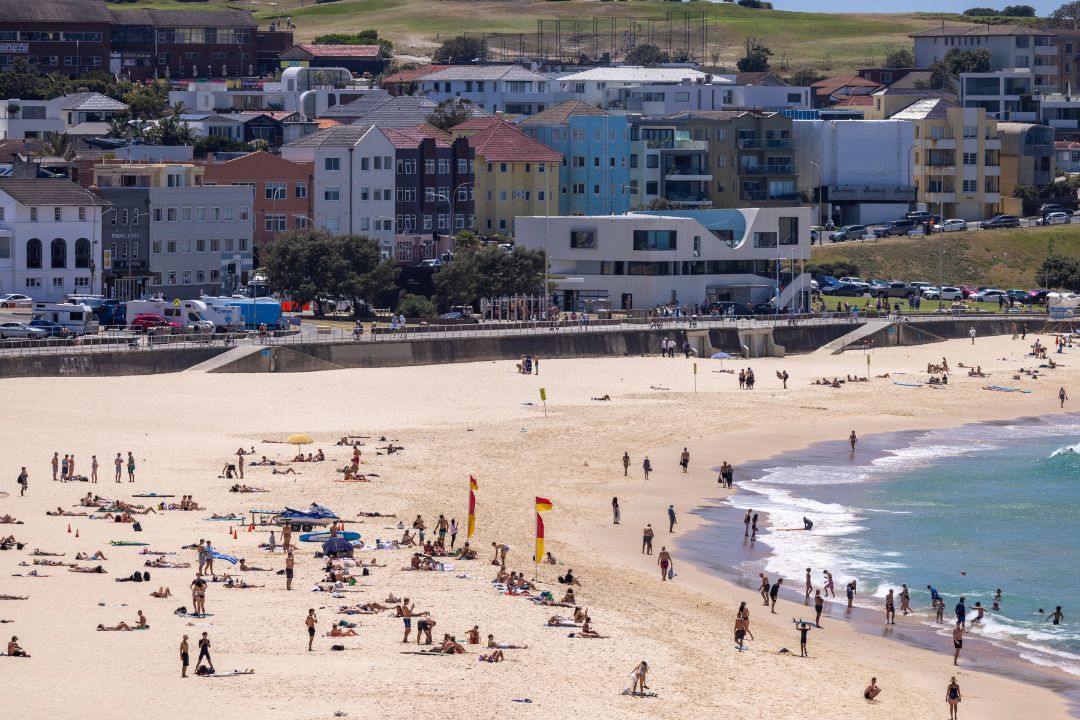 Beachgoers return to Bondi Beach, four days after gunmen killed 15 people in a terrorist attack. Thursday 18th December 2025. Photo: Sitthixay Ditthavong