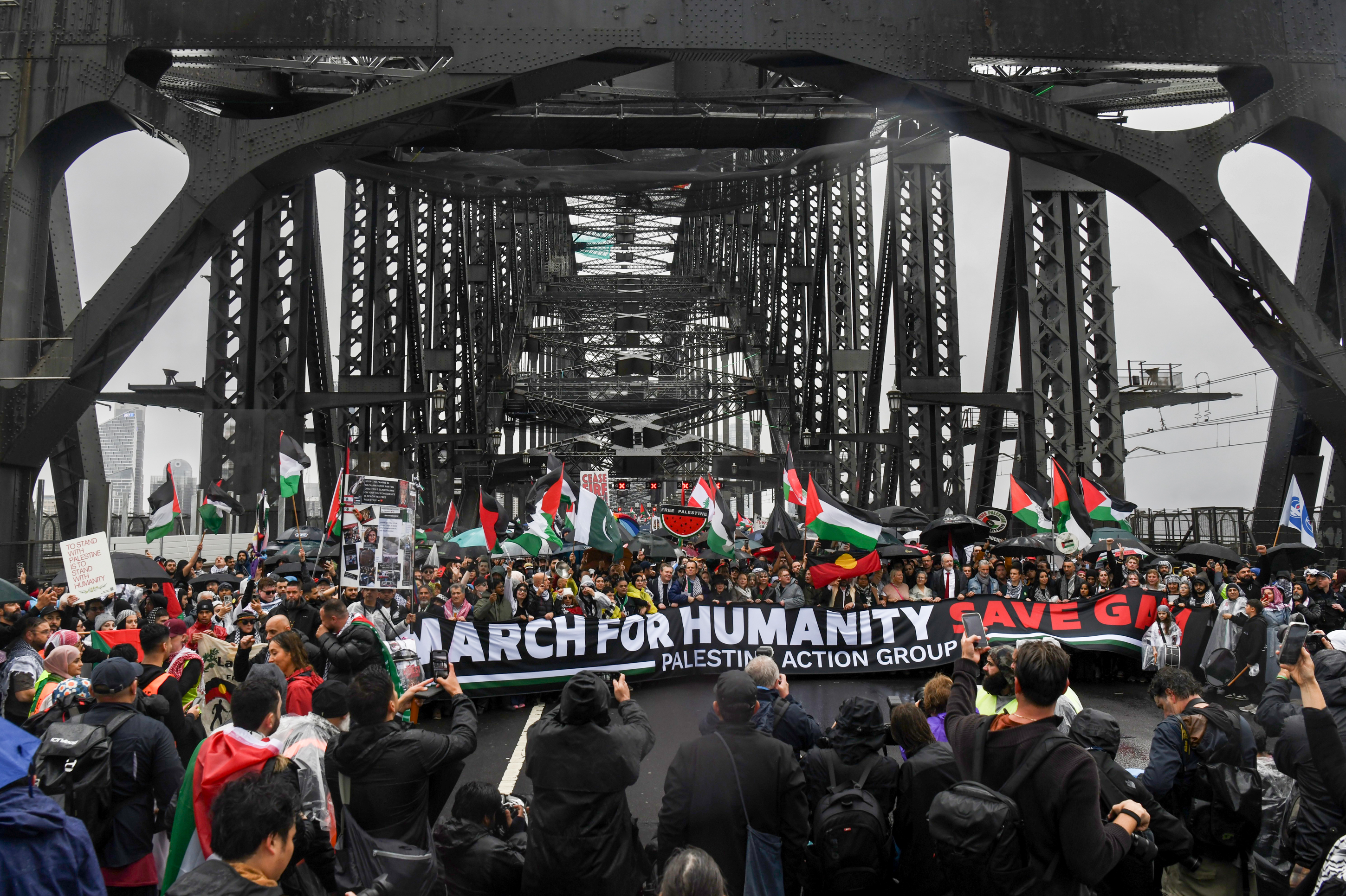 Pro-Palestinian protesters march across the Sydney Harbour Bridge to call for an end to Israel's war in Gaza. Sunday 3rd August 2025