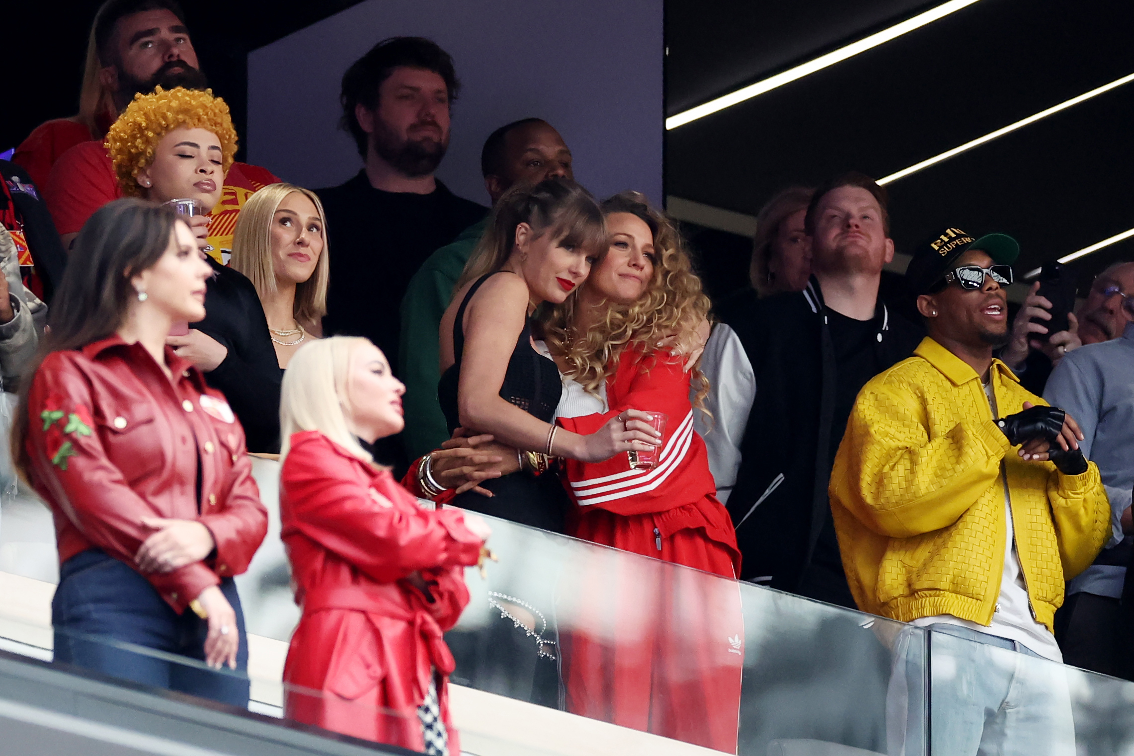 Rapper Ice Spice, Singer Taylor Swift and Actress Blake Lively hug prior to Super Bowl LVIII between the San Francisco 49ers and Kansas City Chiefs at Allegiant Stadium on February 11, 2024 in Las Vegas, Nevada. 