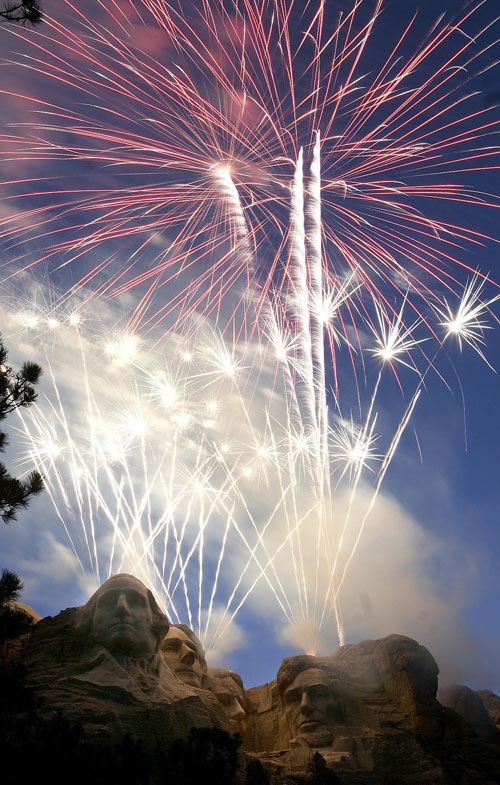 Fireworks light up the night sky over Mt. Rushmore National Memorial, S.D on Tuesday, July 3, 2007