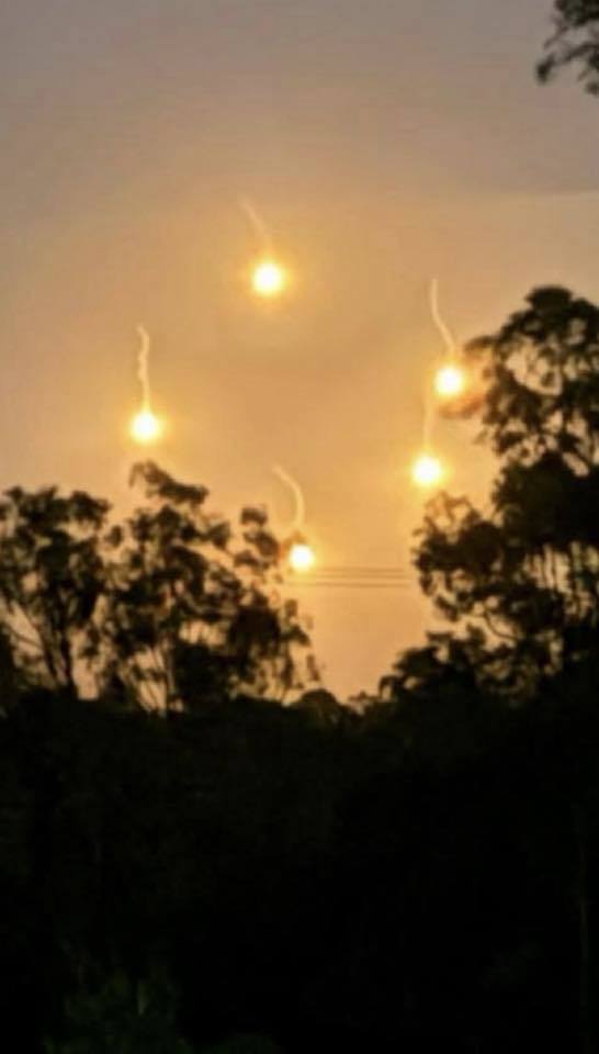 Wild theories have emerged as mysterious "glowing orange orbs" were seen in the sky across parts of the NSW Hunter region. 