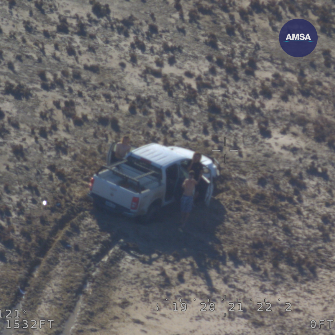 Three stranded teenagers have been rescued after their "help" sign written in sand was spotted pilots flying over Western Australia.