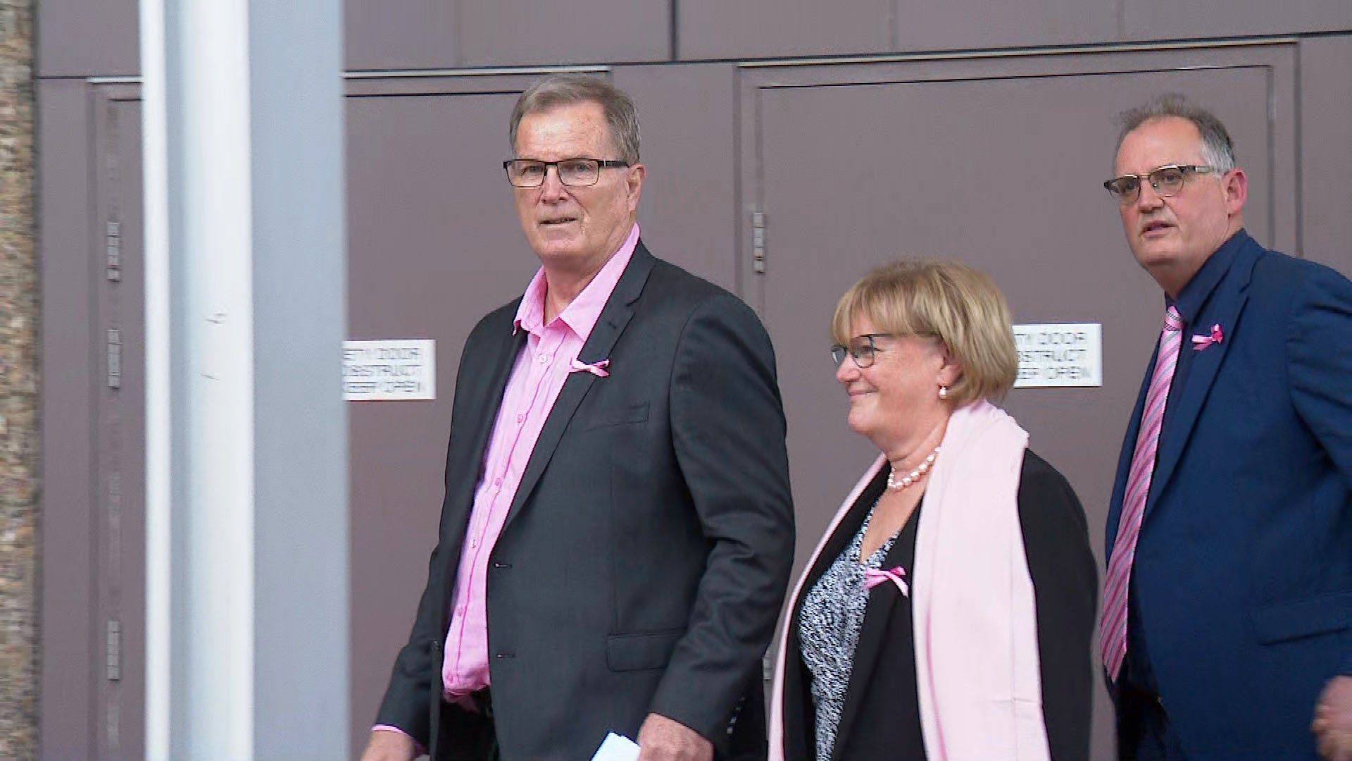 Lynette Dawson's brother Greg Simms and wife Merilyn Simms outside court