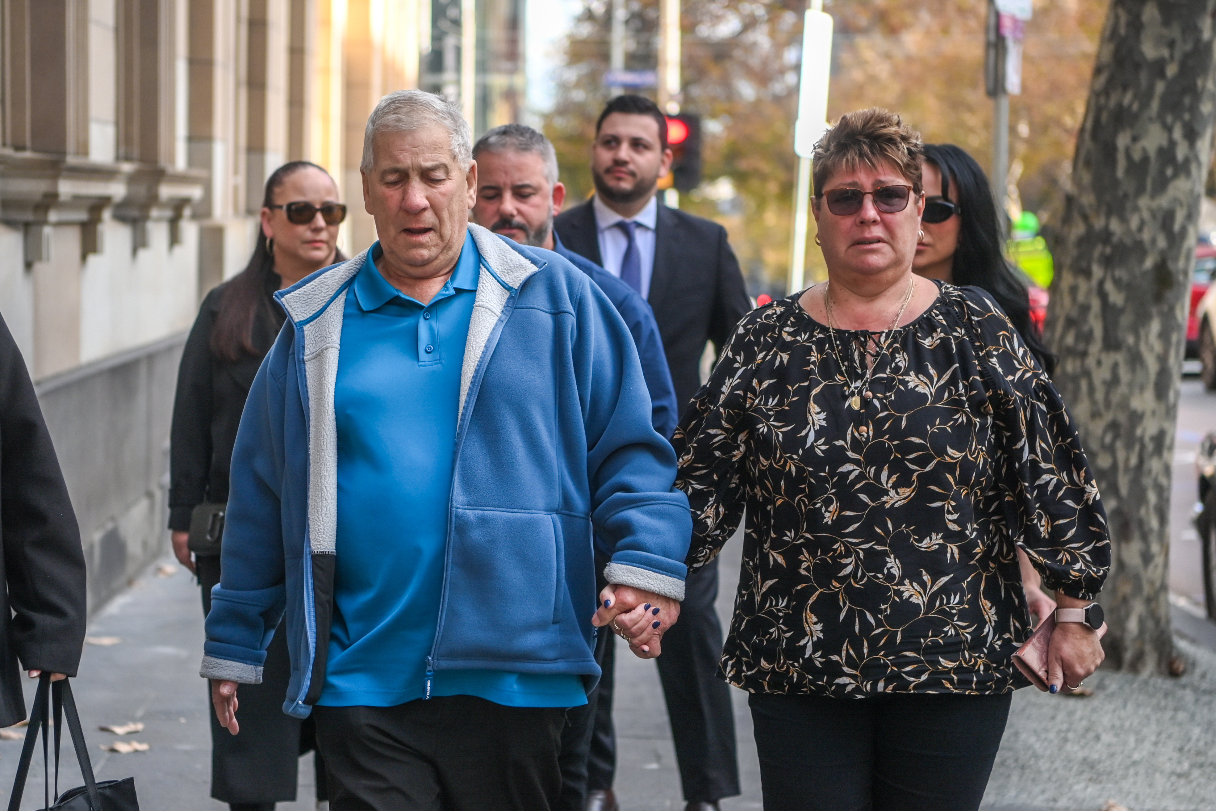 The Age, News, 12/06/2025, photo by Justin McManus. Ash Gordon murder trail Supreme ct. Dr Ash Gordon during a home invasion in Doncaster. Parents Glen and Catherine Gordon along with other family members arriving at court.