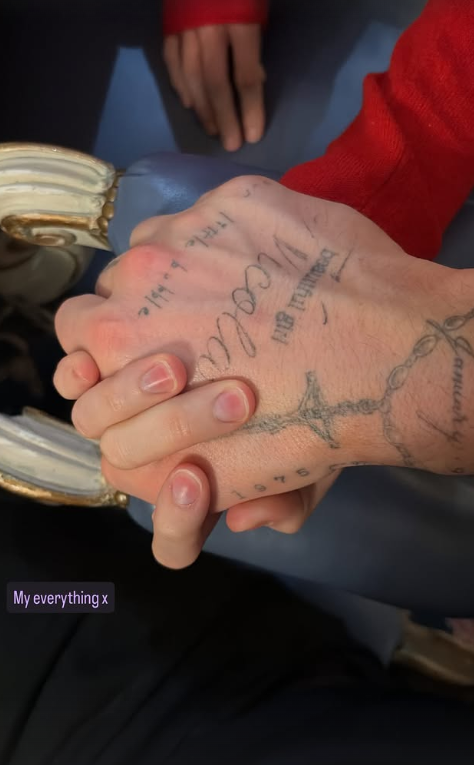 Brooklyn Peltz Beckham holds Nicola Peltz Beckham's hand