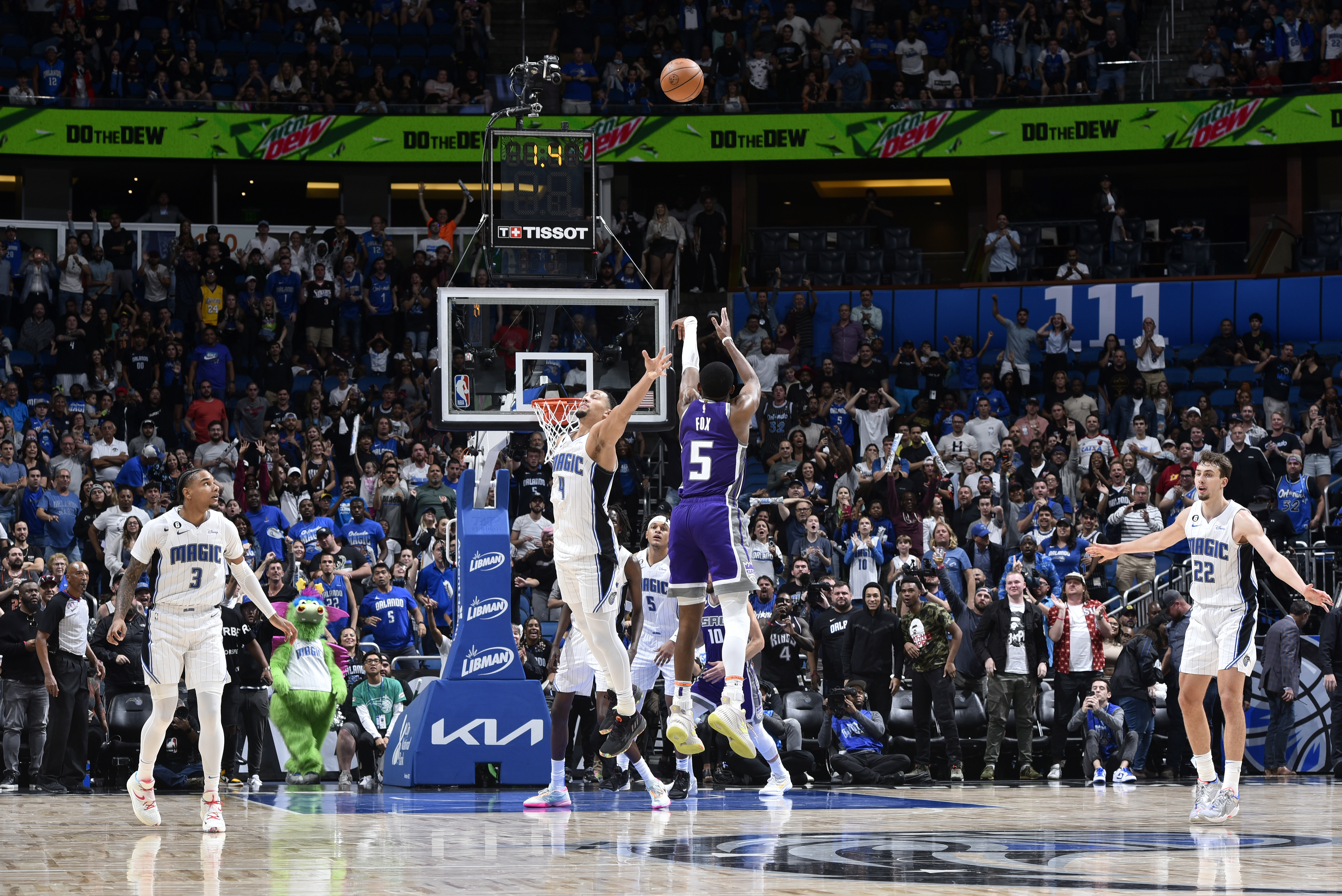 The Kings' De'Aaron Fox hits the game winning three point shot against the Magic.