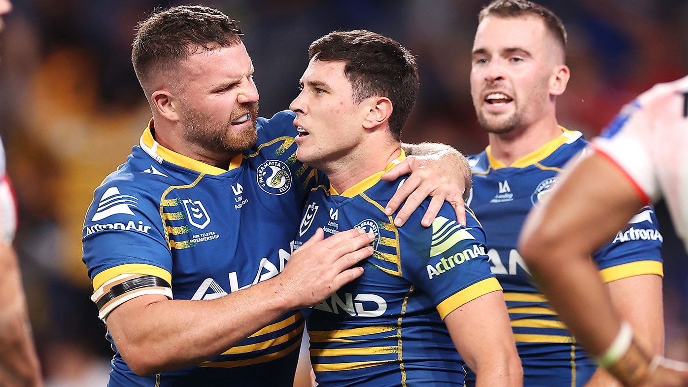 Nathan Brown congratulates Mitchell Moses after a try