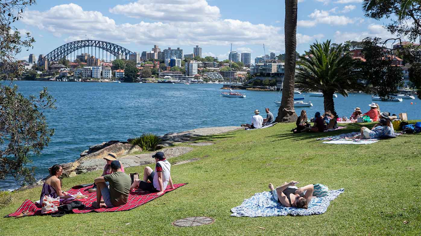 Picnickers gather at Cremorne Point in Sydney on the October long weekend.