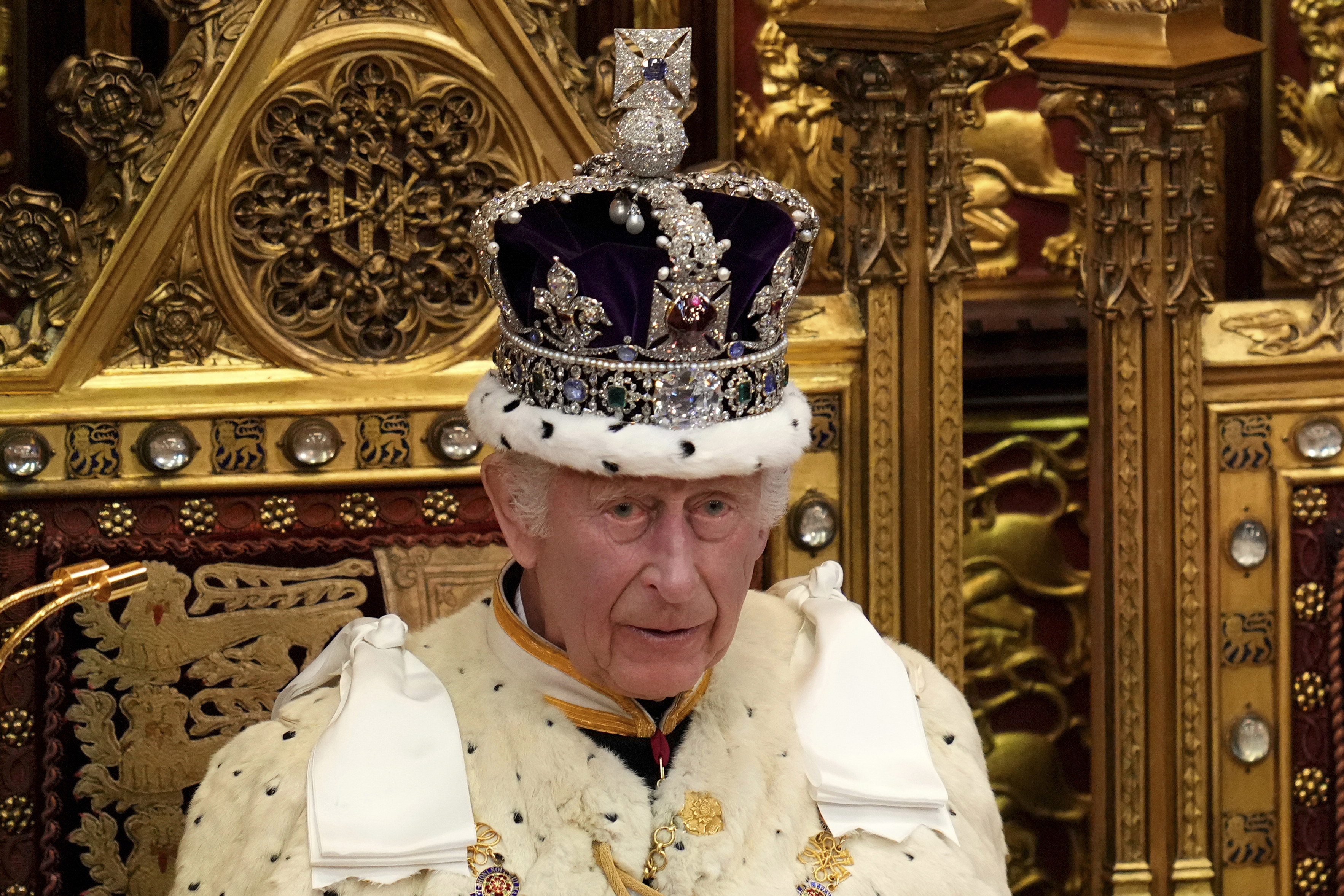 King Charles III wearing the Imperial State Crown attends the State Opening of Parliament in the House of Lords, London, Wednesday, July 17, 2024. (AP Photo/Kirsty Wigglesworth, Pool File)