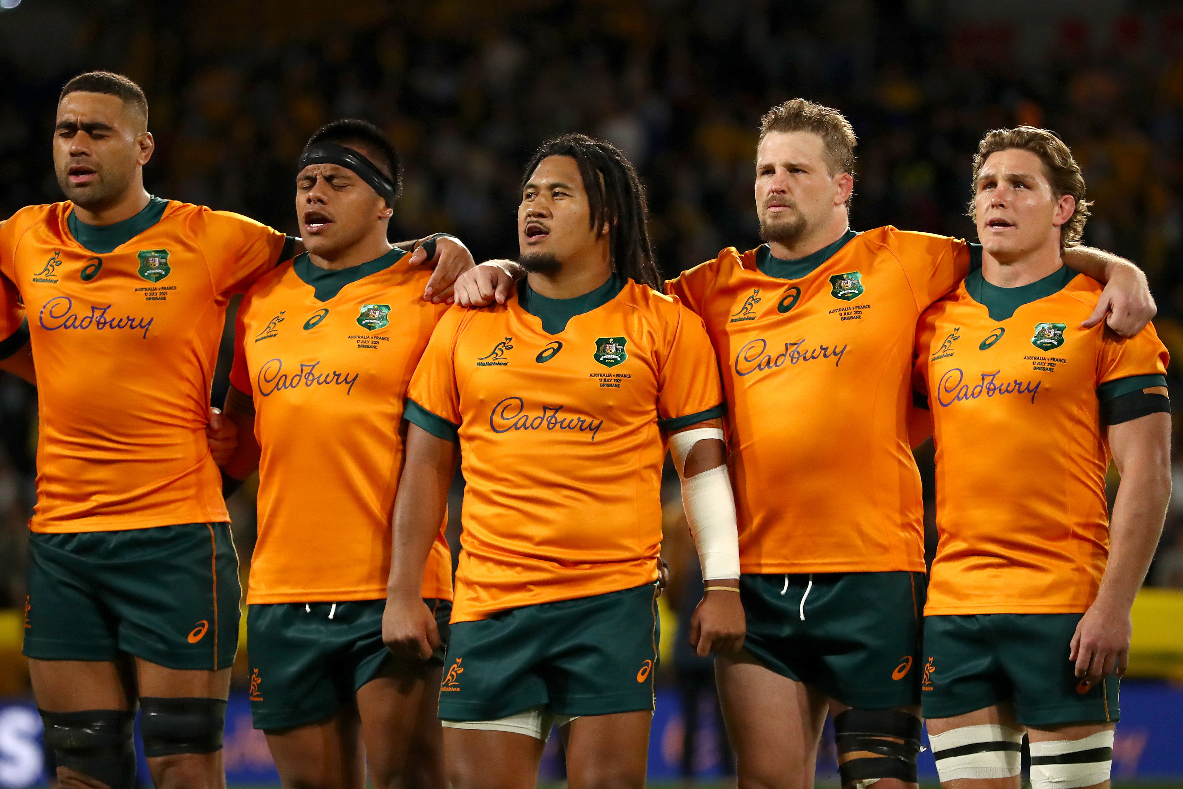 Lukhan Salakaia-Loto (from left) of the Wallabies, Allan Alaalatoa, Brandon Paenga-Amosa (middle), James Slipper, and Michael Hooper during the national anthem in 2021.