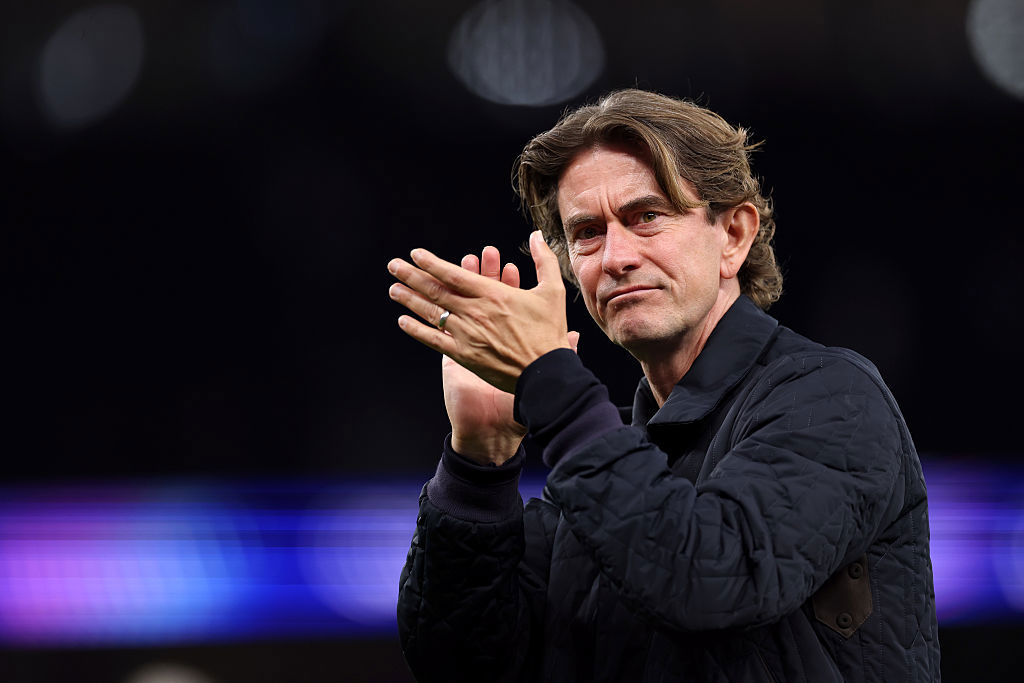 Thomas Frank of Tottenham Hotspur applauds the fans.