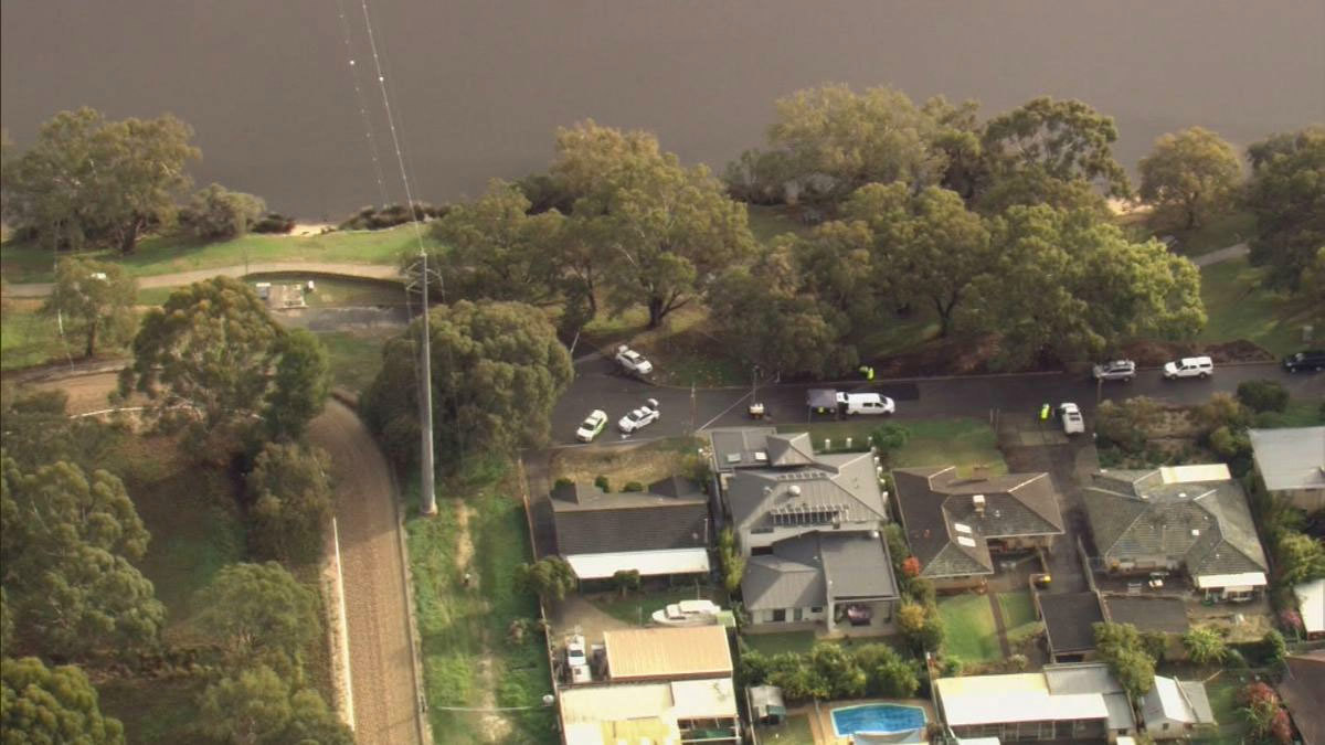 Neighbours were forced to stay inside as police arrived at the scene of the alleged incident.