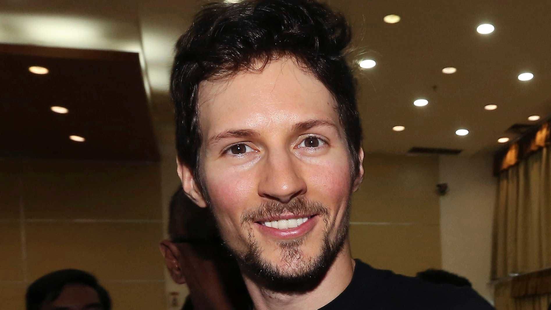 Telegram co-founder Pavel Durov, center, smiles following his meeting with Indonesian Communication and Information Minister Rudiantara in Jakarta, Indonesia on Aug. 1, 2017.