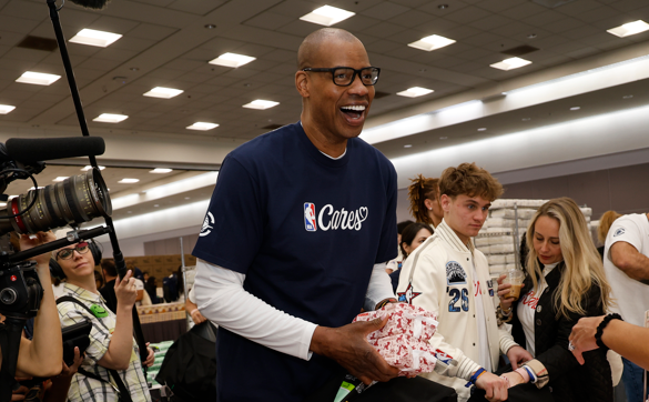 Jason Collins smiles during the NBA Cares All-Star Day of Service in 2026.