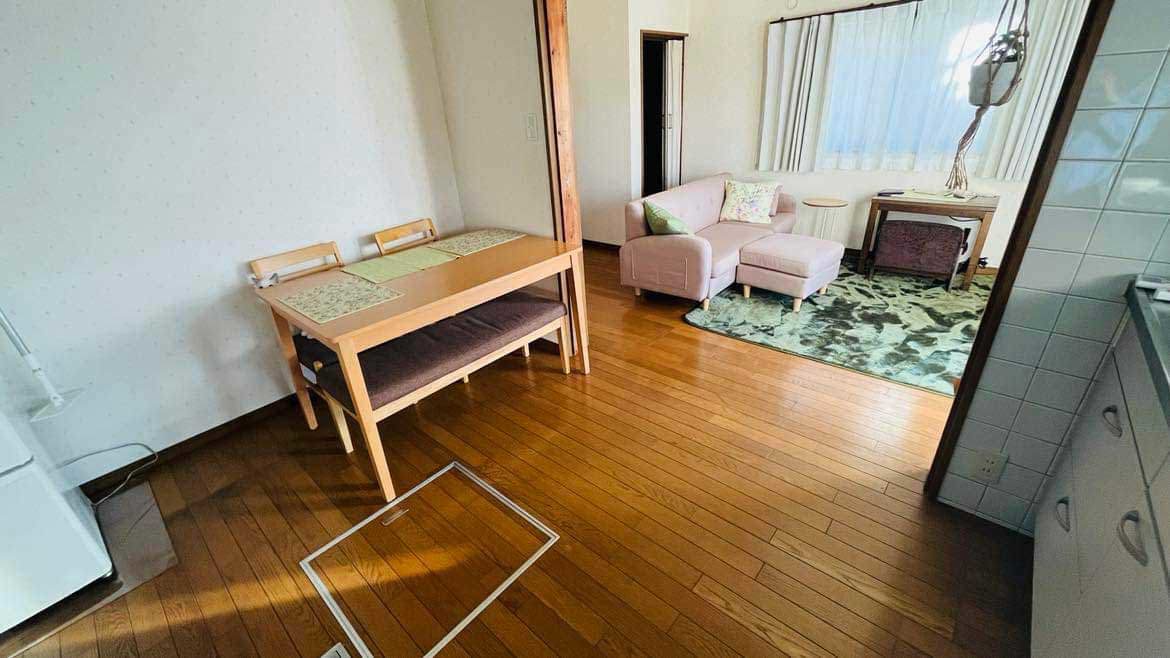 The living room and kitchen area in Chani's house.