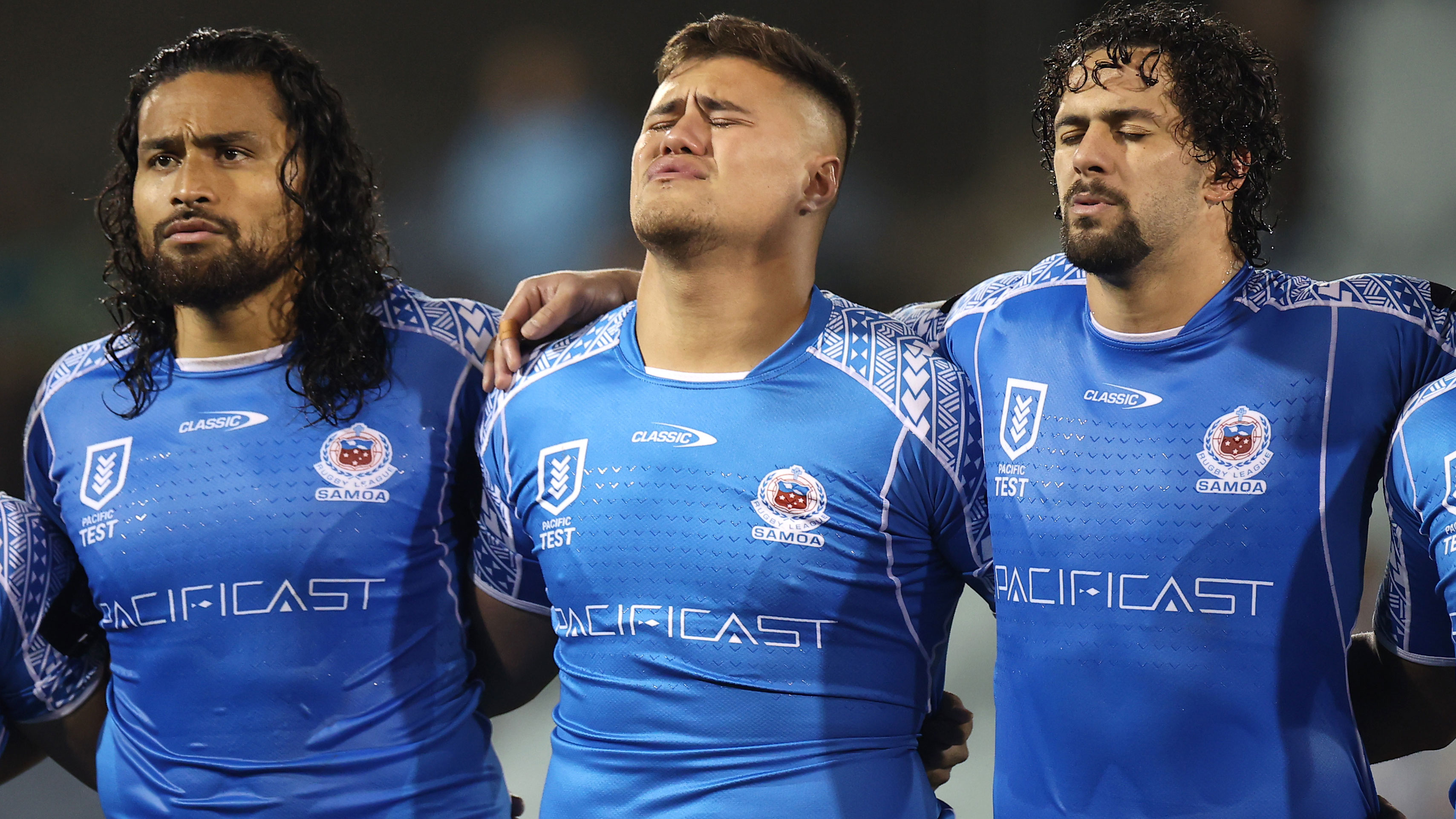 Bunty Afoa, Josh Schuster and Josh Aloiai of Samoa sing the national anthem ahead of their clash with the Cook Islands in June. 