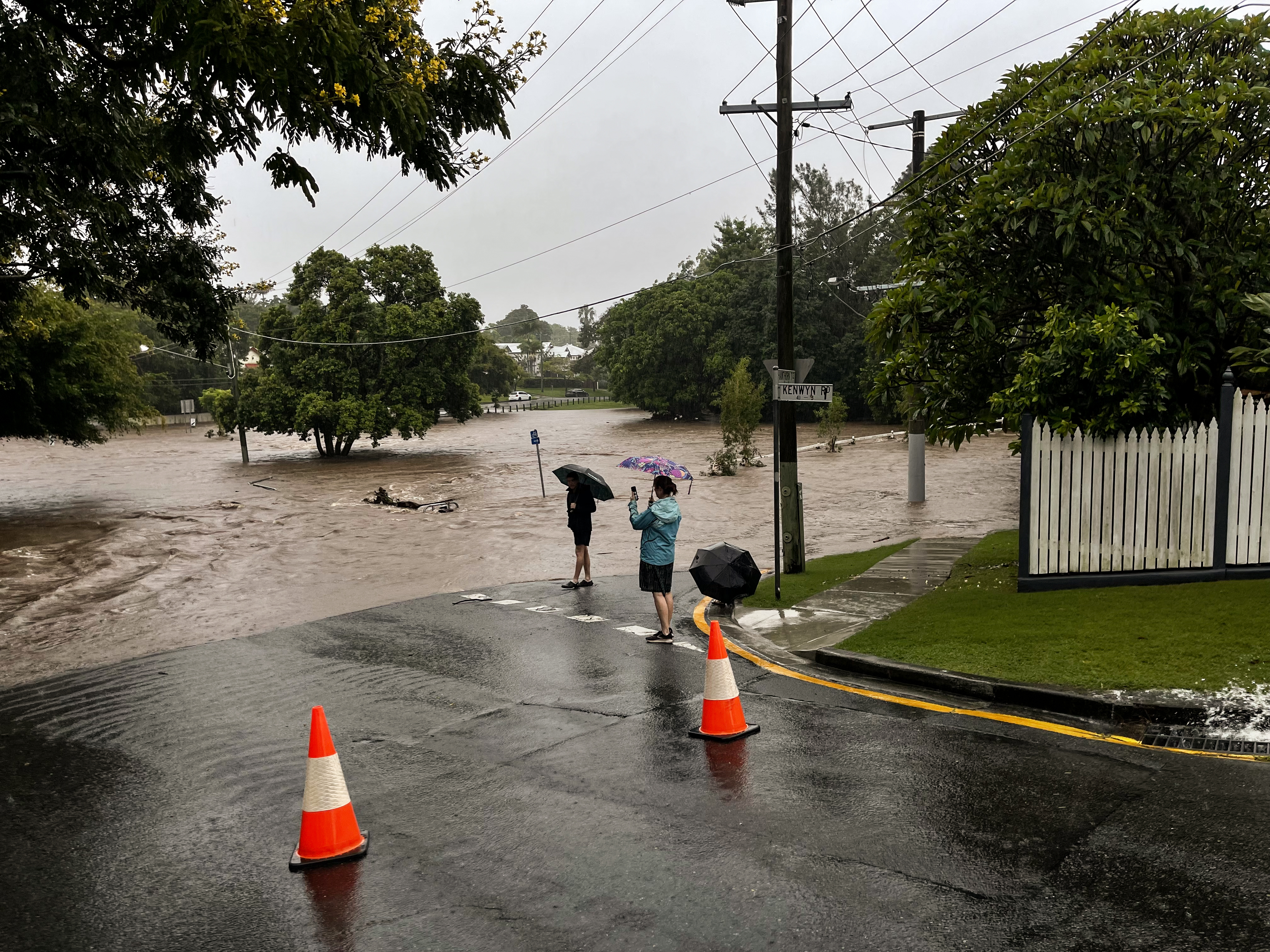 Flooding along Ithaca Creek in Bardon and Red Hill on Sunday, February 27, 2022. Credit: Matt Dennien