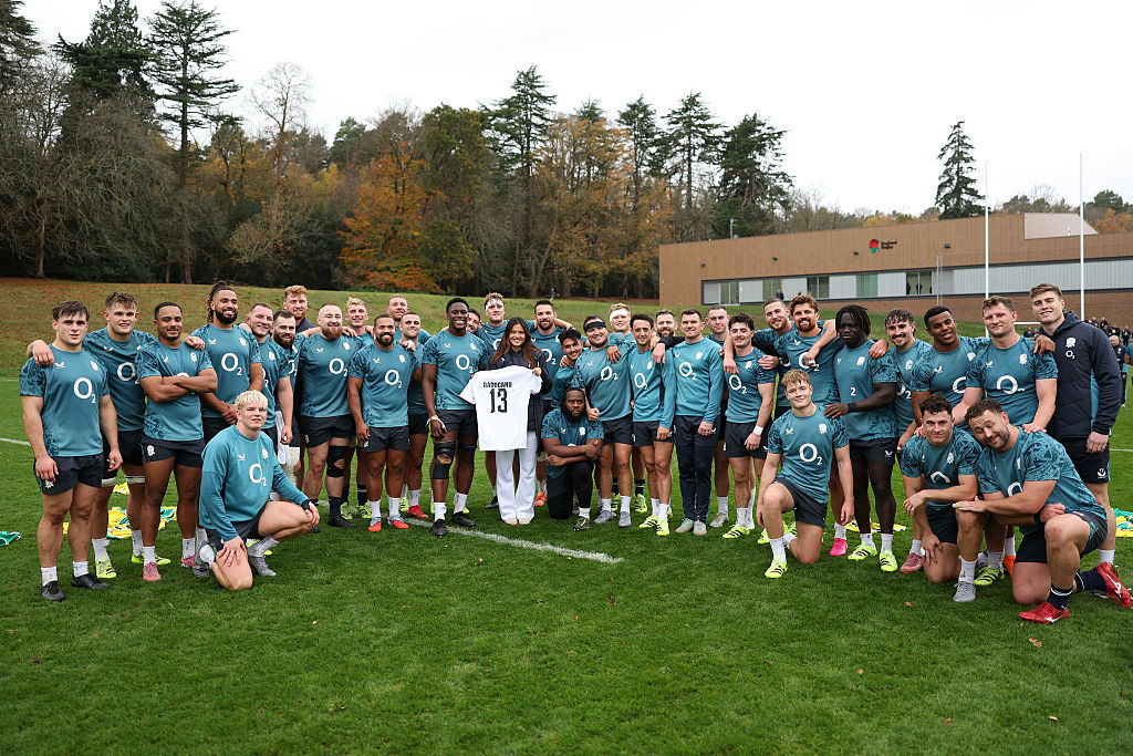 British tennis player Emma Raducanu is presented with an England rugby jersey.