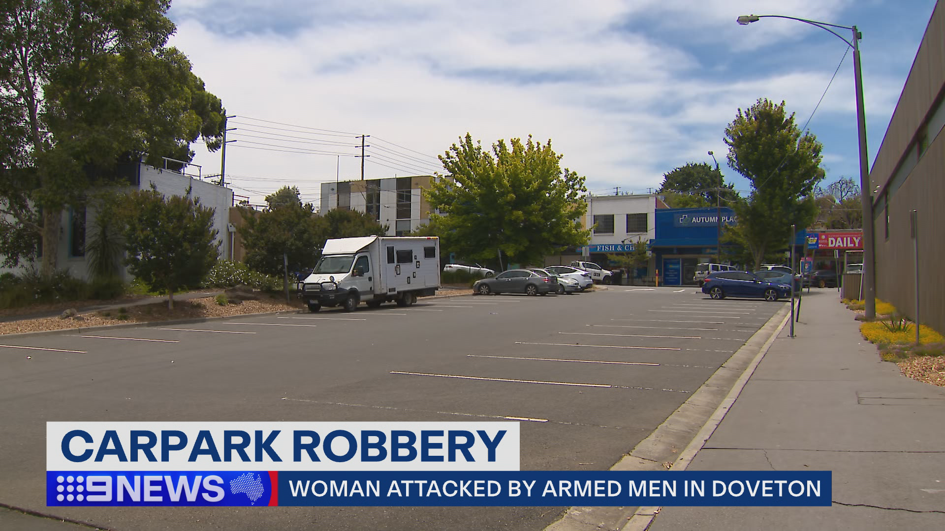 Police are searching for two men after a woman was robbed by two armed men in the Melbourne this morning.
