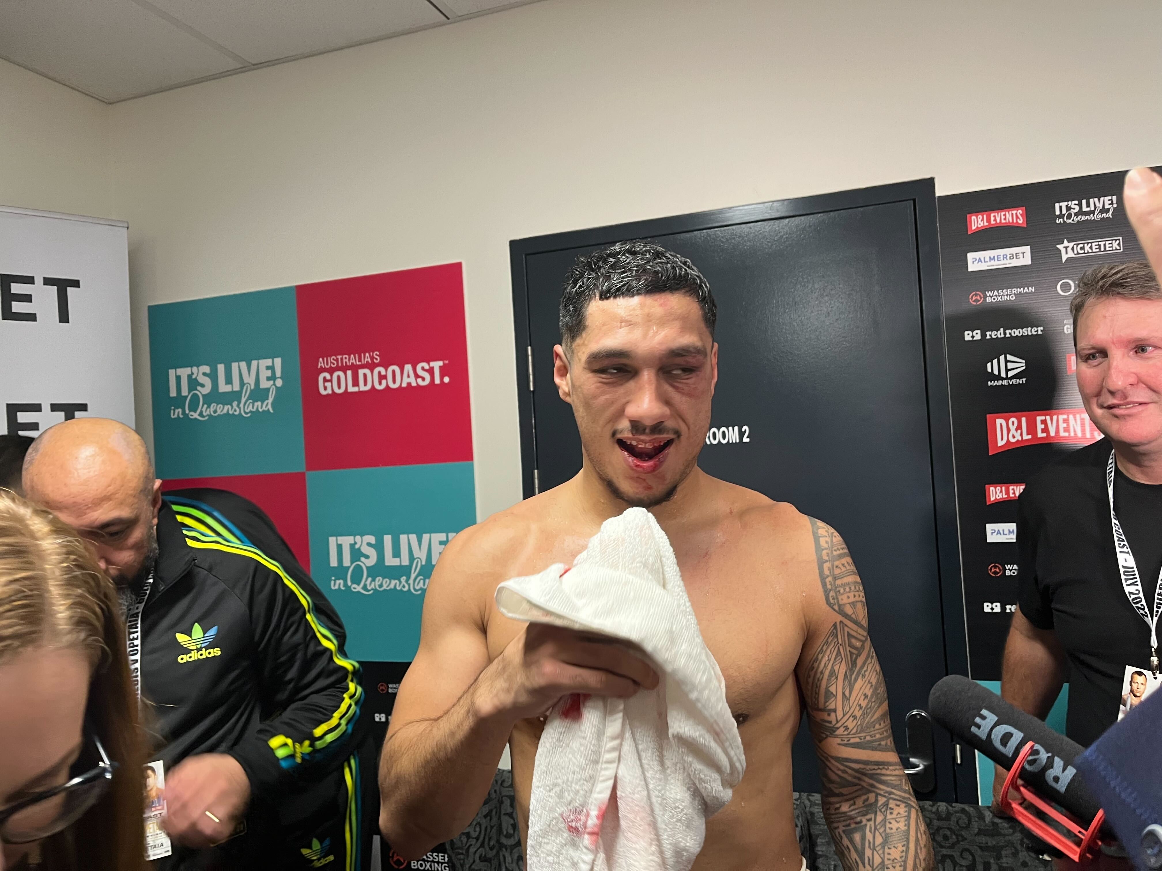 Jai Opetaia shows off his busted jaw after winning the IBF cruiserweight world title.