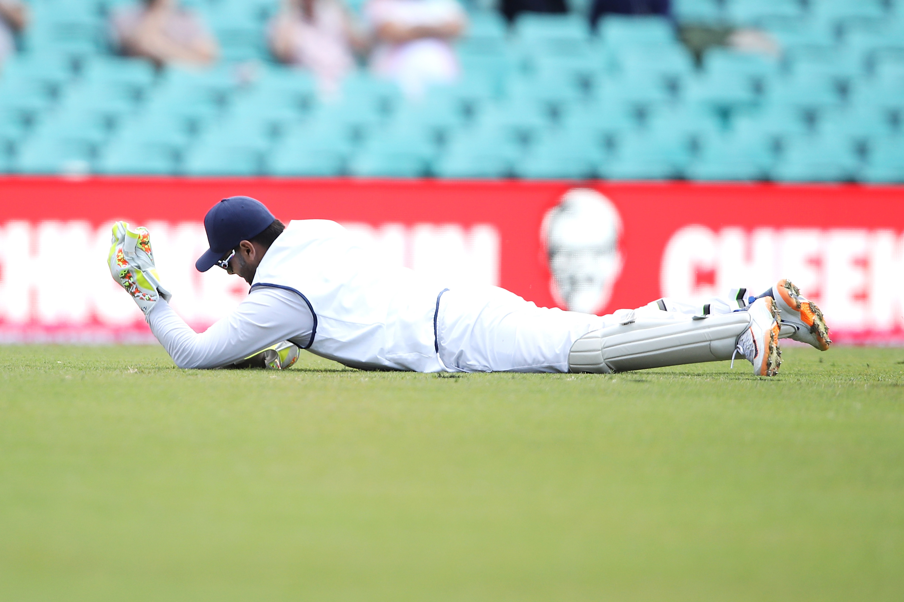 Rishabh Pant claims the catch of Will Pucovski only to have the decision overturned.