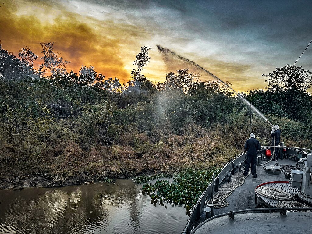 Firefighters battle a blaze in the Pantanal, Brazil, July 2024.