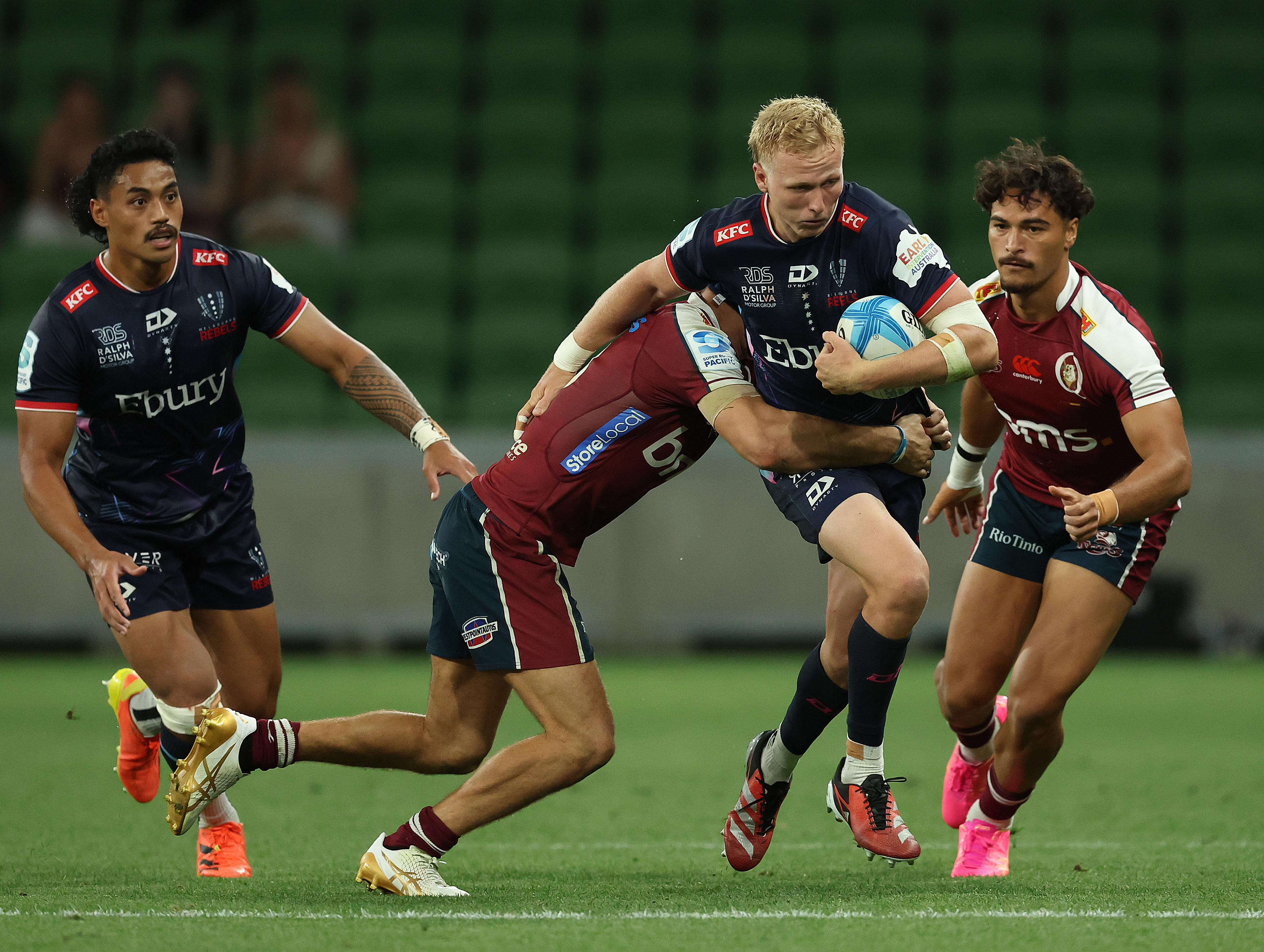 Carter Gordon of the Rebels runs with the ball during the round four Super Rugby Pacific match against the Melbourne Rebels.