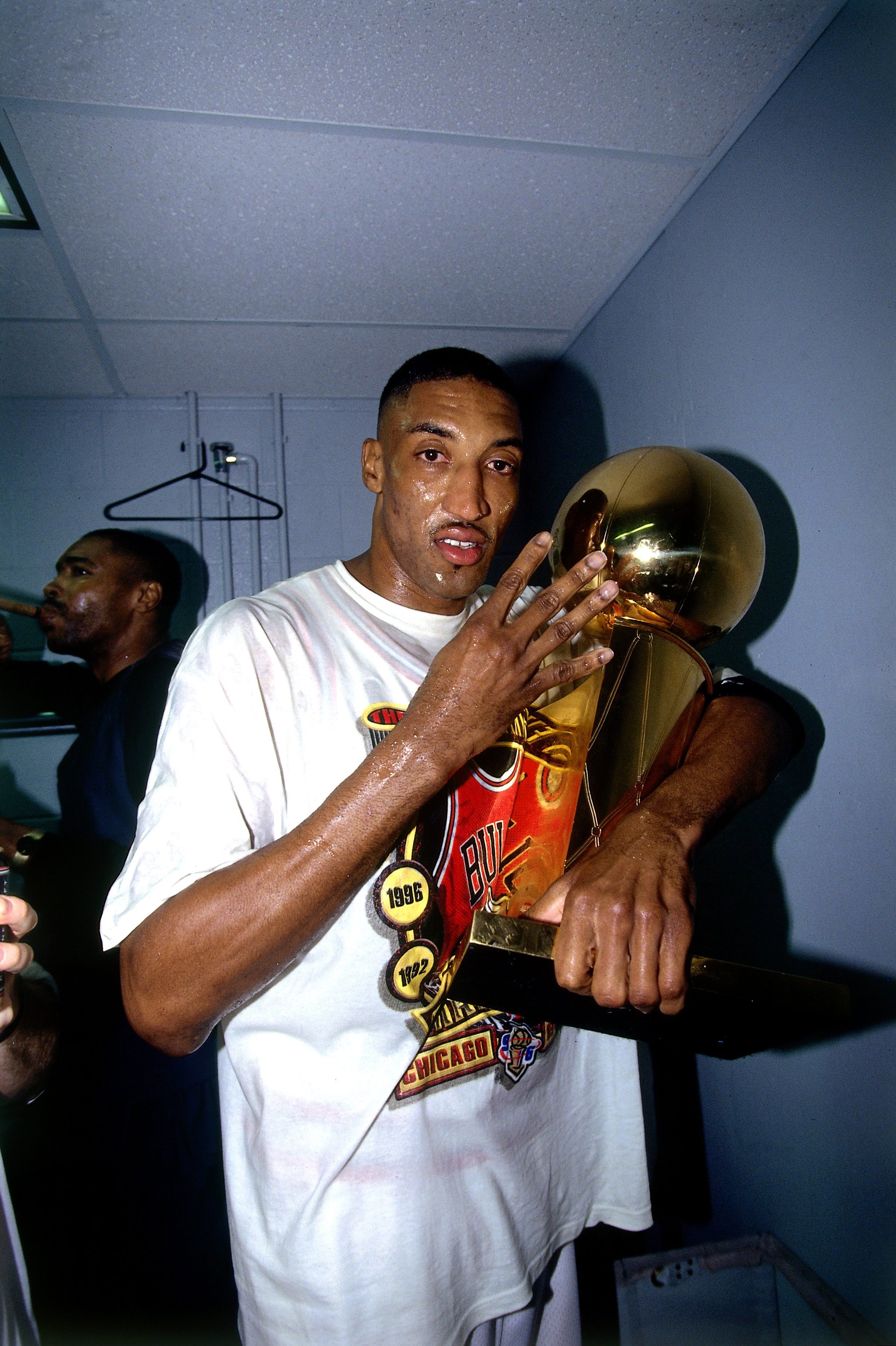 CHICAGO - JUNE 16:  Scottie Pippen #33 of the Chicago Bulls celebrates with the Larry O'Brien trophy after defeating the Seattle SuperSonics in Game Six of the 1996 NBA Finals at the United Center on June 16, 1996 in Chicago Iillinois.  The Bulls won 87-75. NOTE TO USER: User expressly acknowledges that, by downloading and or using this photograph, User is consenting to the terms and conditions of the Getty Images License agreement. Mandatory Copyright Notice: Copyright 1996 NBAE (Photo by Andre