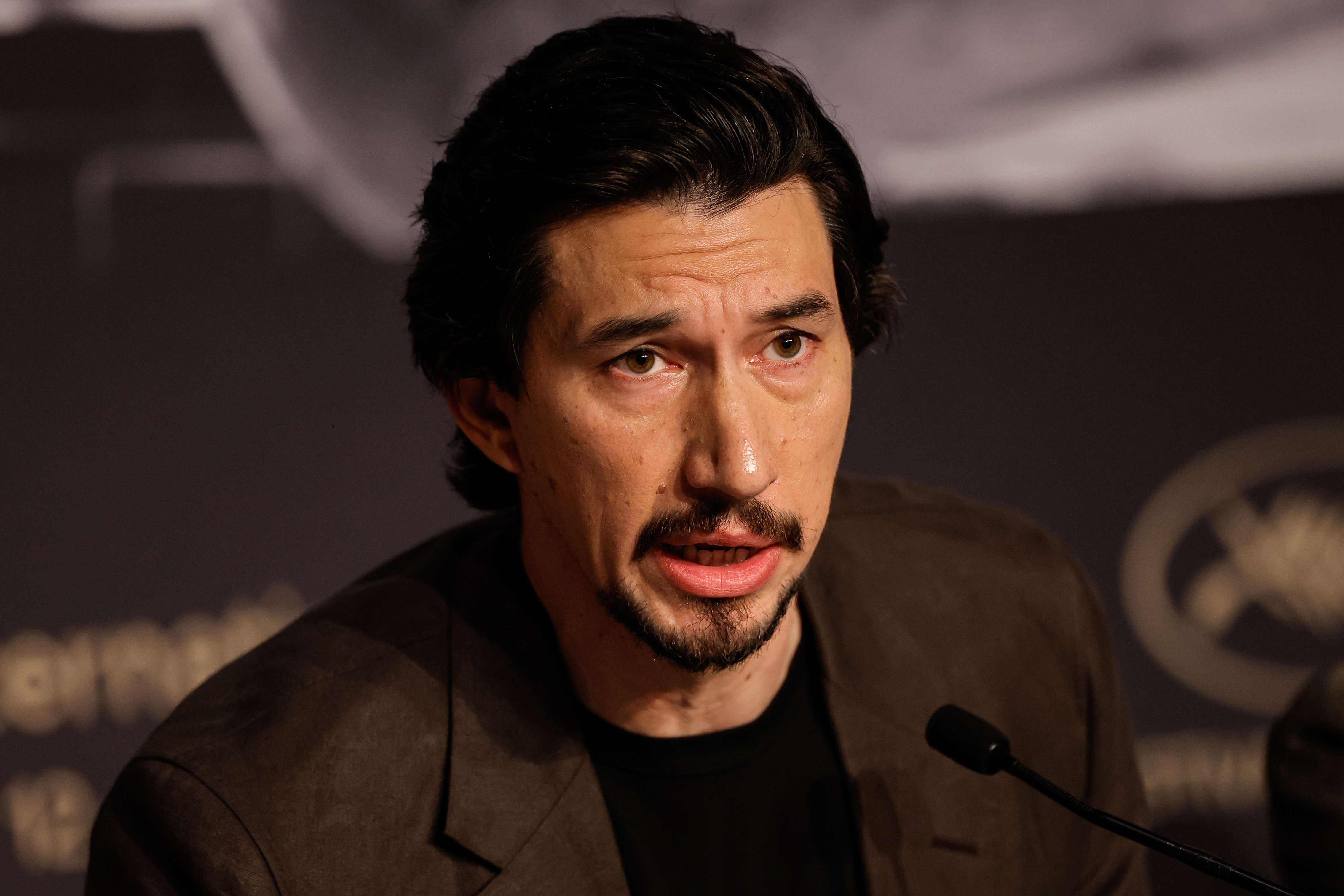  Adam Driver speaks during the "Paper Tiger" press conference at the 79th annual Cannes Film Festival at Palais des Festivals on May 17, 2026 in Cannes, France. (Photo by Teresa Suarez/Pool/Getty Images)
