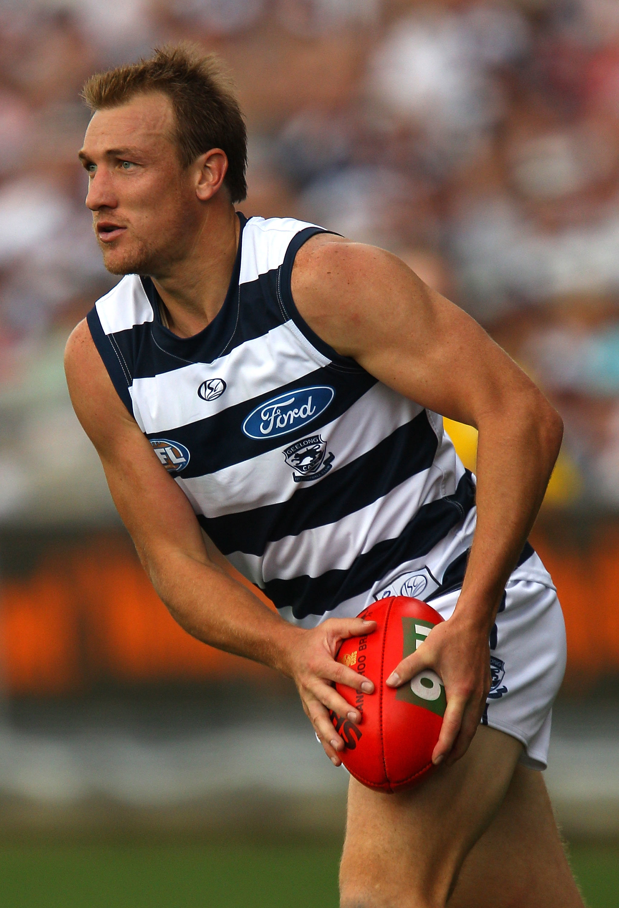 Darren Milburn wore the number 39 and won two flags for the Cats.