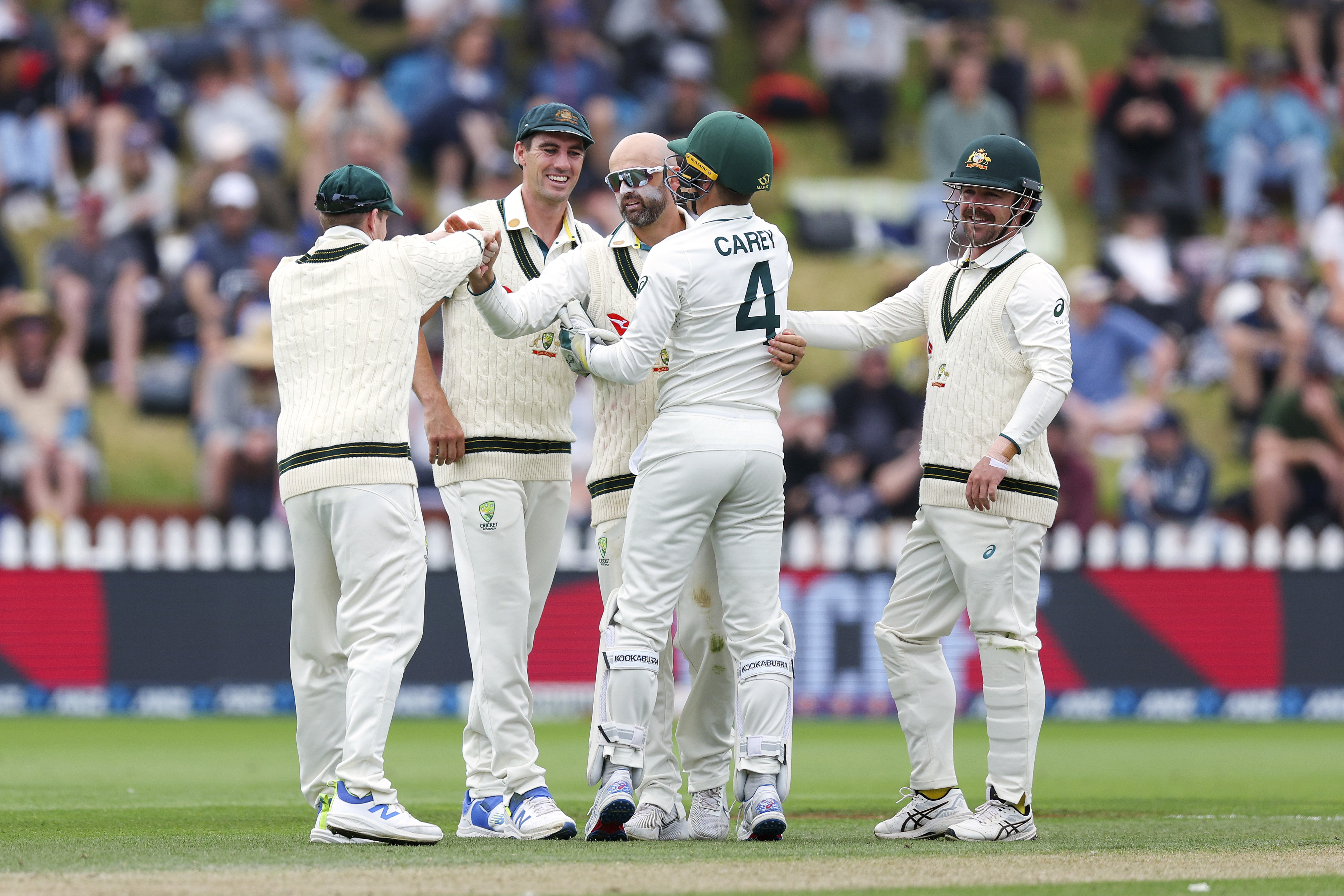 Nathan Lyon of Australia celebrates after taking the wicket of Glenn Phillips of New Zealand for a five wicket bag during day four of the First Test in the series between New Zealand and Australia at Basin Reserve on March 03, 2024 in Wellington, New Zealand. (Photo by Hagen Hopkins/Getty Images)