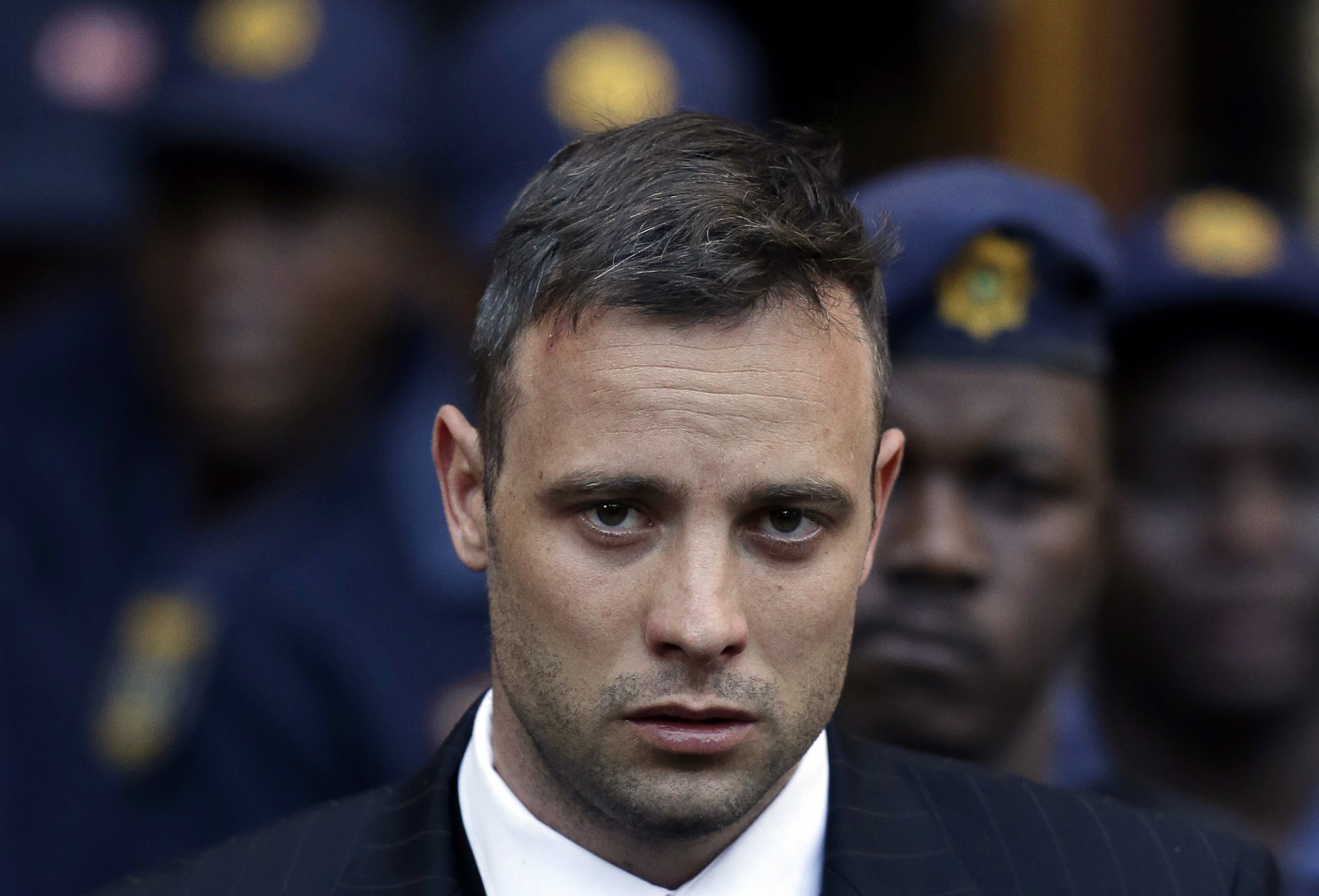 Oscar Pistorius leaves the High Court in Pretoria, South Africa, Wednesday, June 15, 2016, after his sentencing proceedings. 