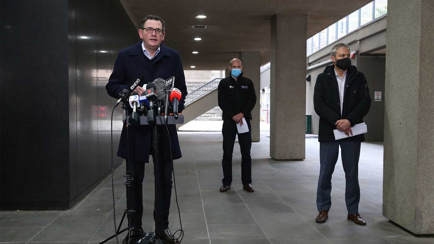 Brett Sutton (right) at a 2021 COVID-19 press conference with then-premier Daniel Andrews and COVID-19 commander Jeroen Weimar.