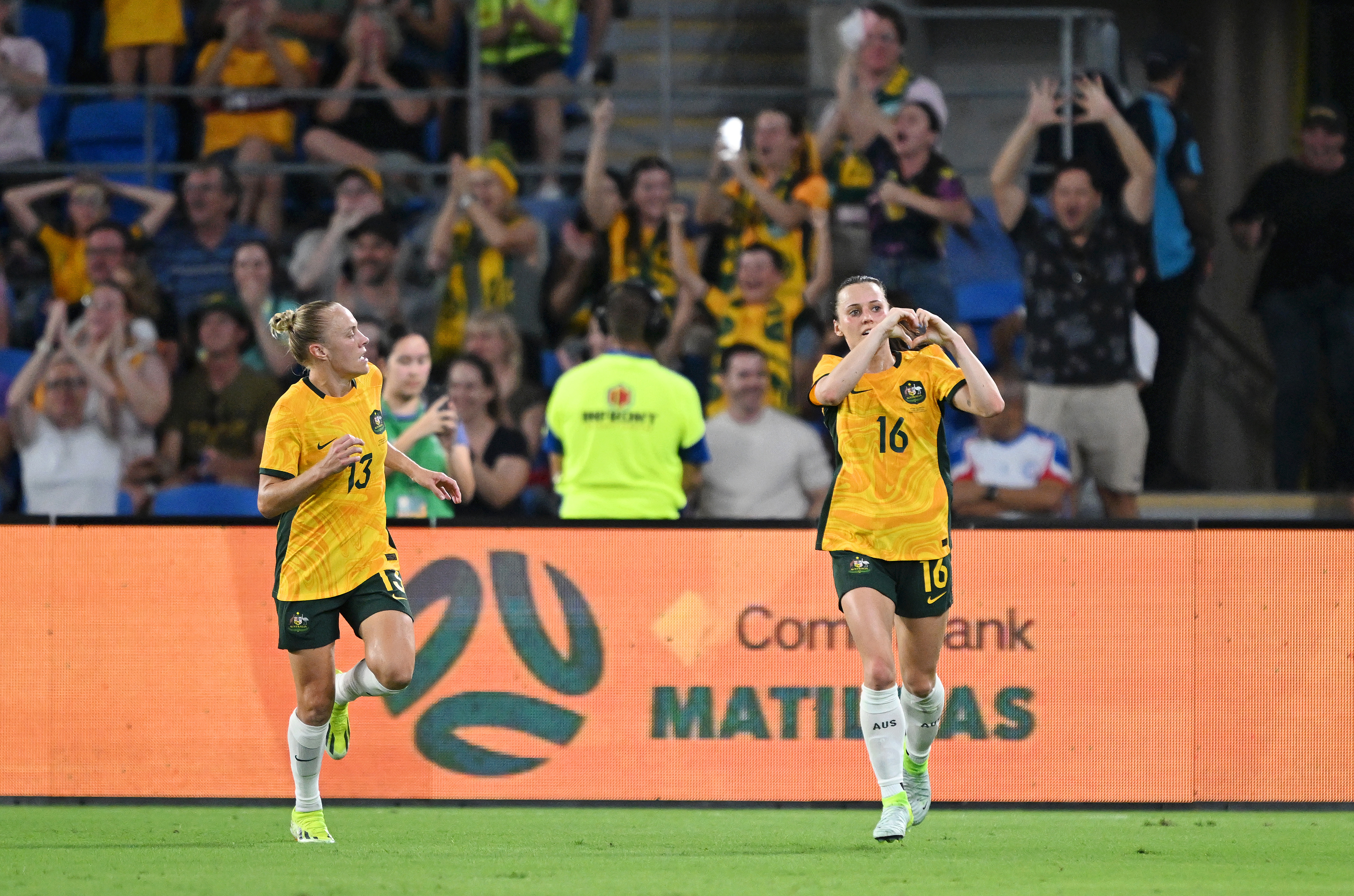 Hayley Raso celebrates after scoring the Matildas' opening goal against Brazil.