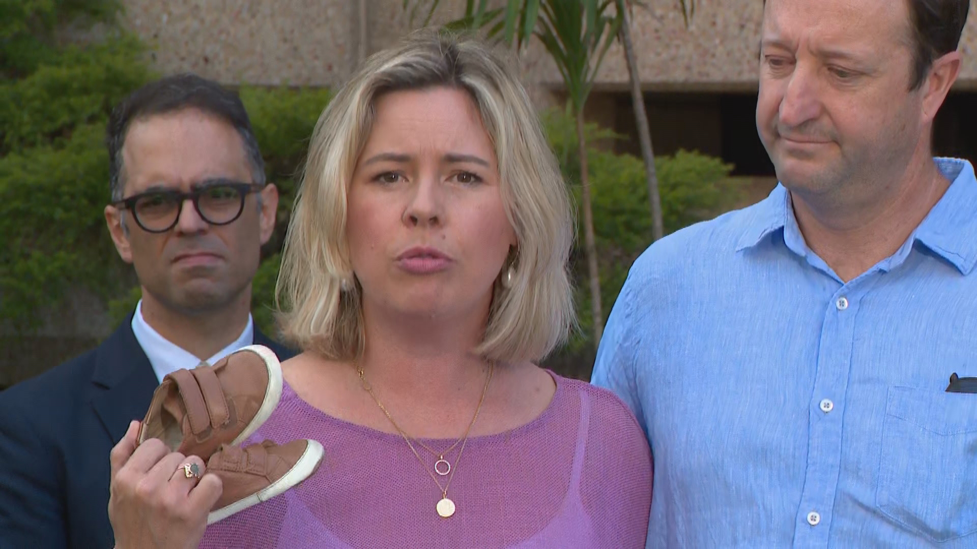 Elouise Massa holds son Joe Massa's shoes Northern Beaches hospital sydney nsw