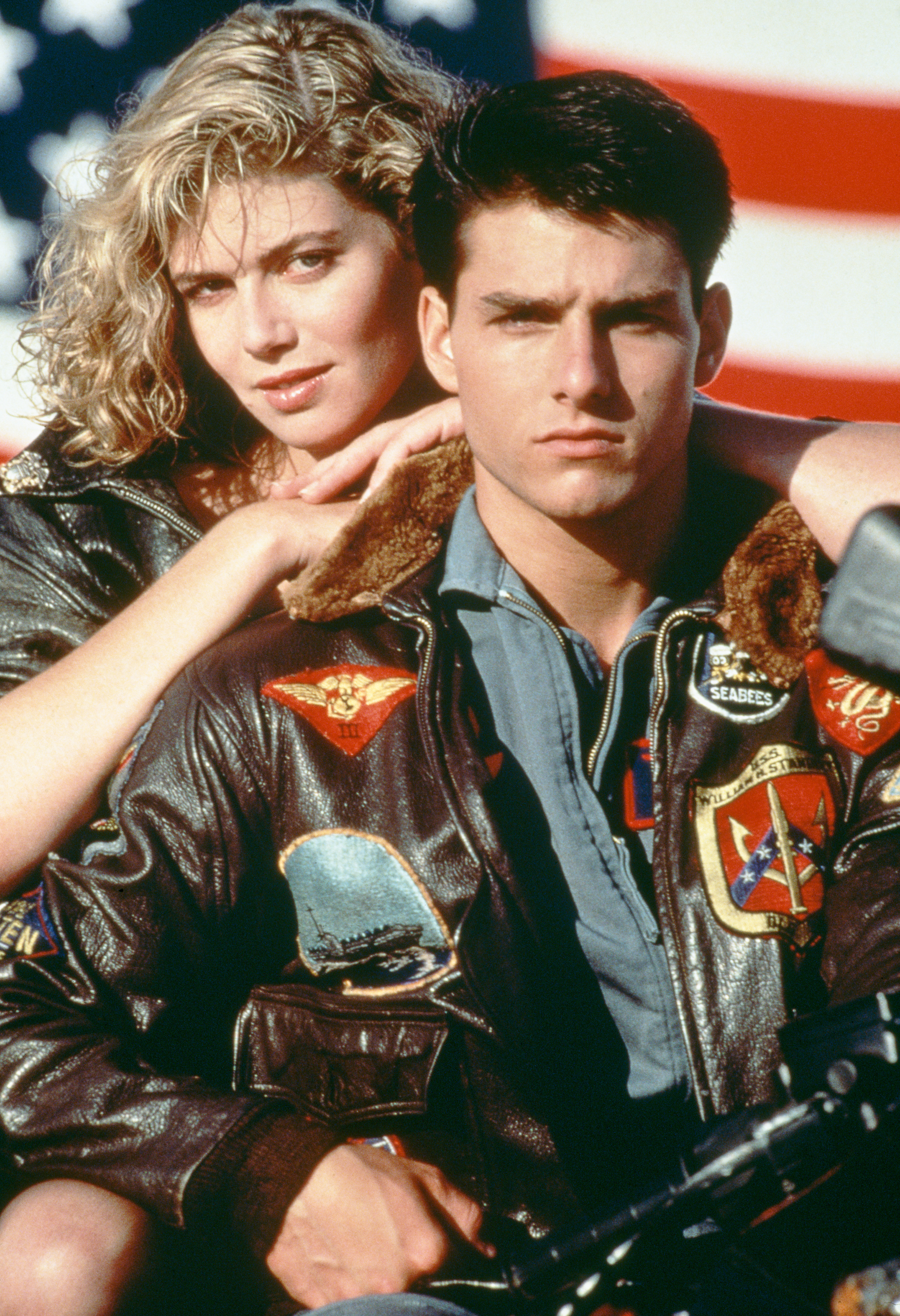Tom Cruise as Lieutenant Pete 'Maverick' Mitchell, and Kelly McGillis as Charlotte 'Charlie' Blackwood in Top Gun