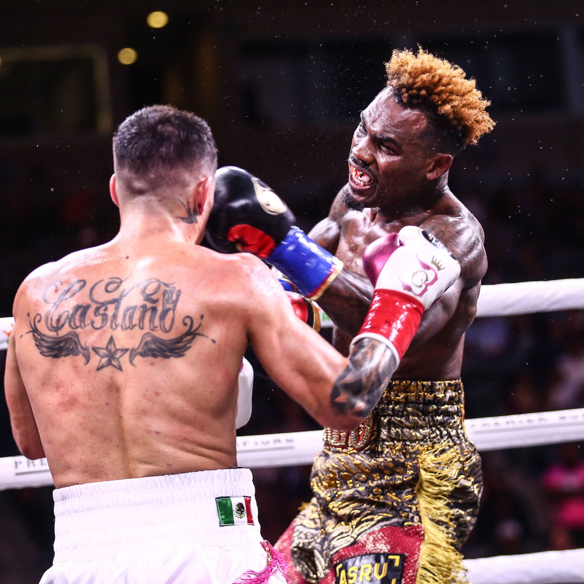 Jermell Charlo lands a punch on Brian Castano in their epic bout.