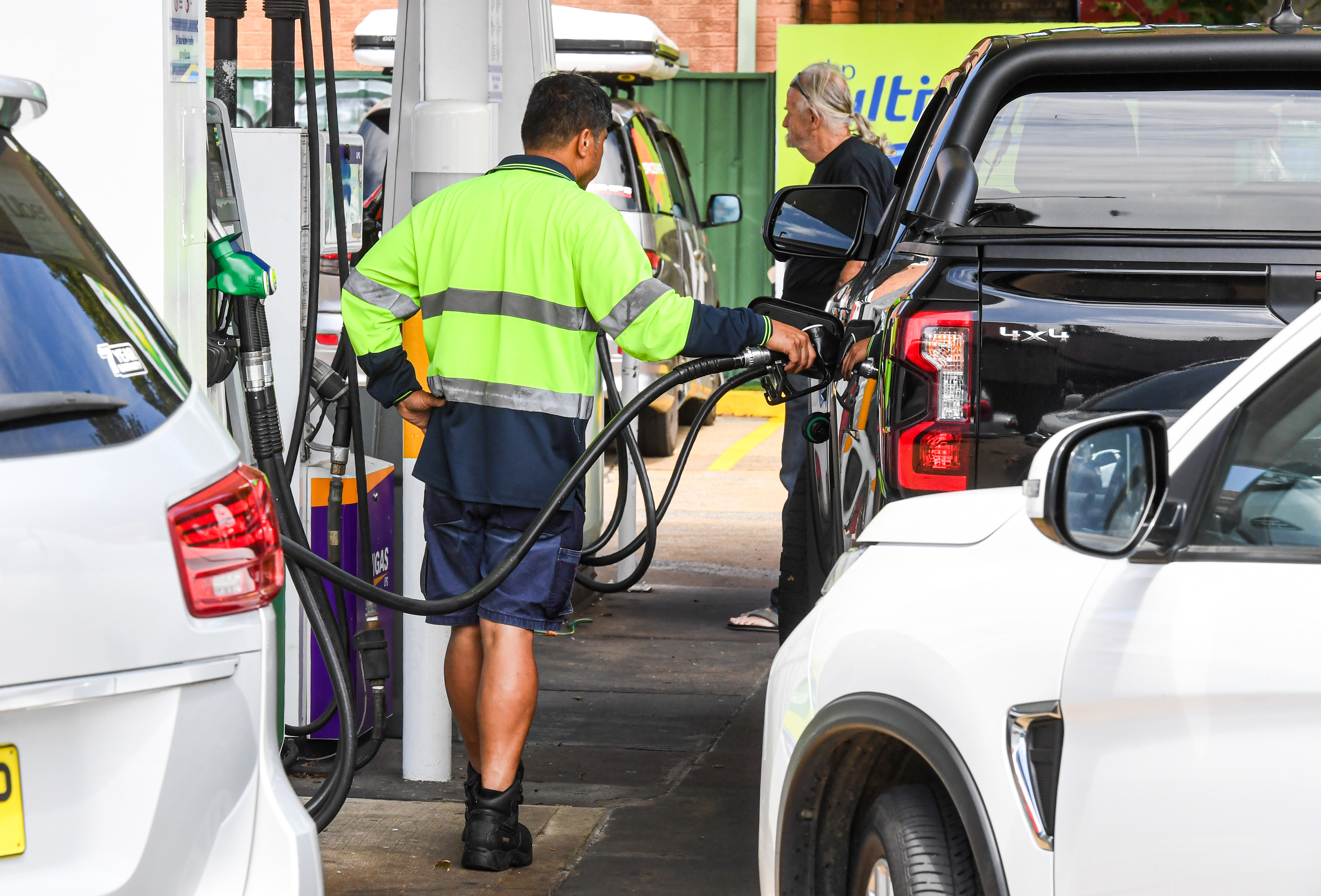 Long queues for petrol at a Sydney service station.