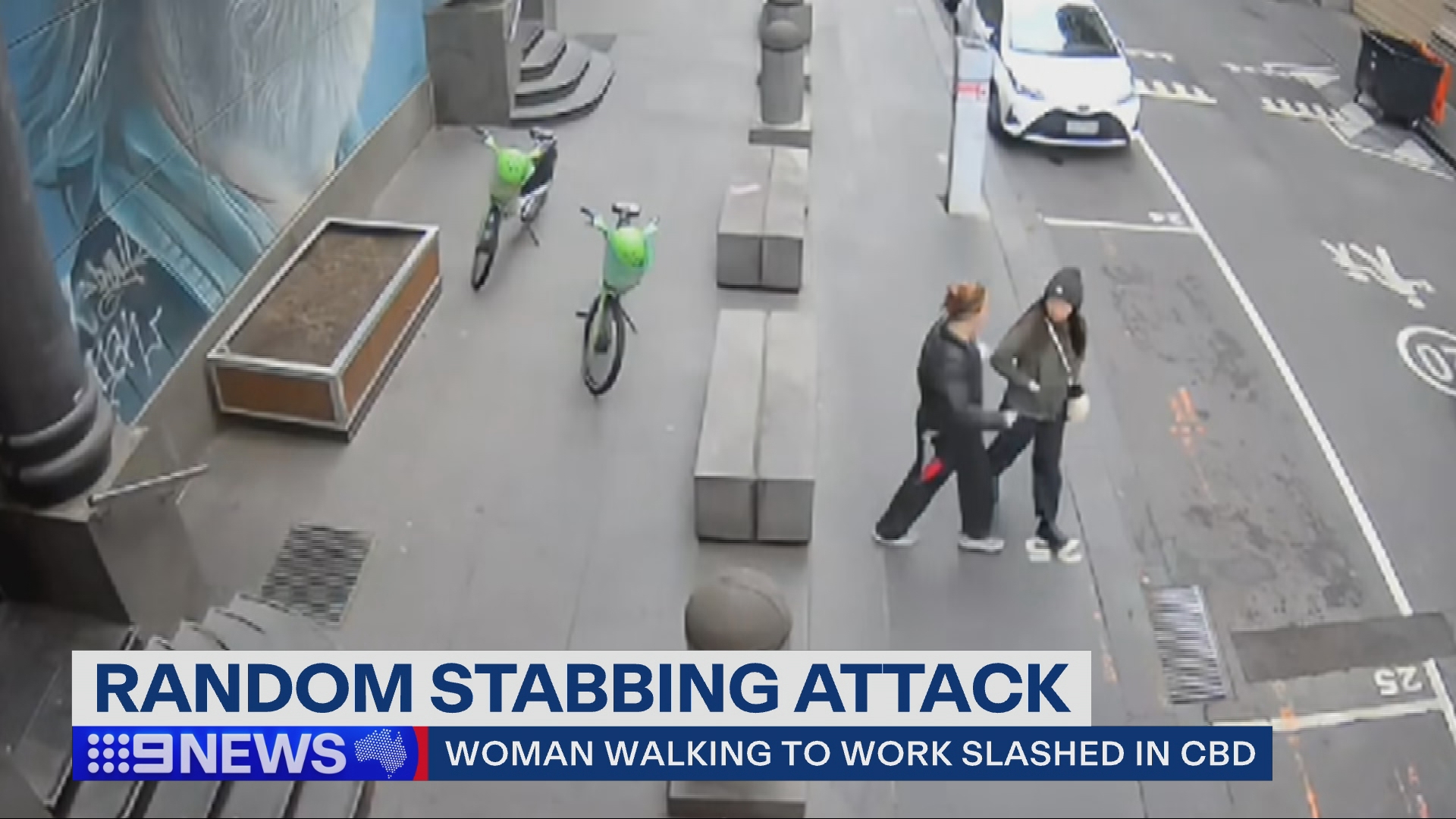 CCTV footage has shown the moment a woman was randomly stabbed in broad daylight while walking to work at a sushi restaurant in Melbourne's CBD. ﻿