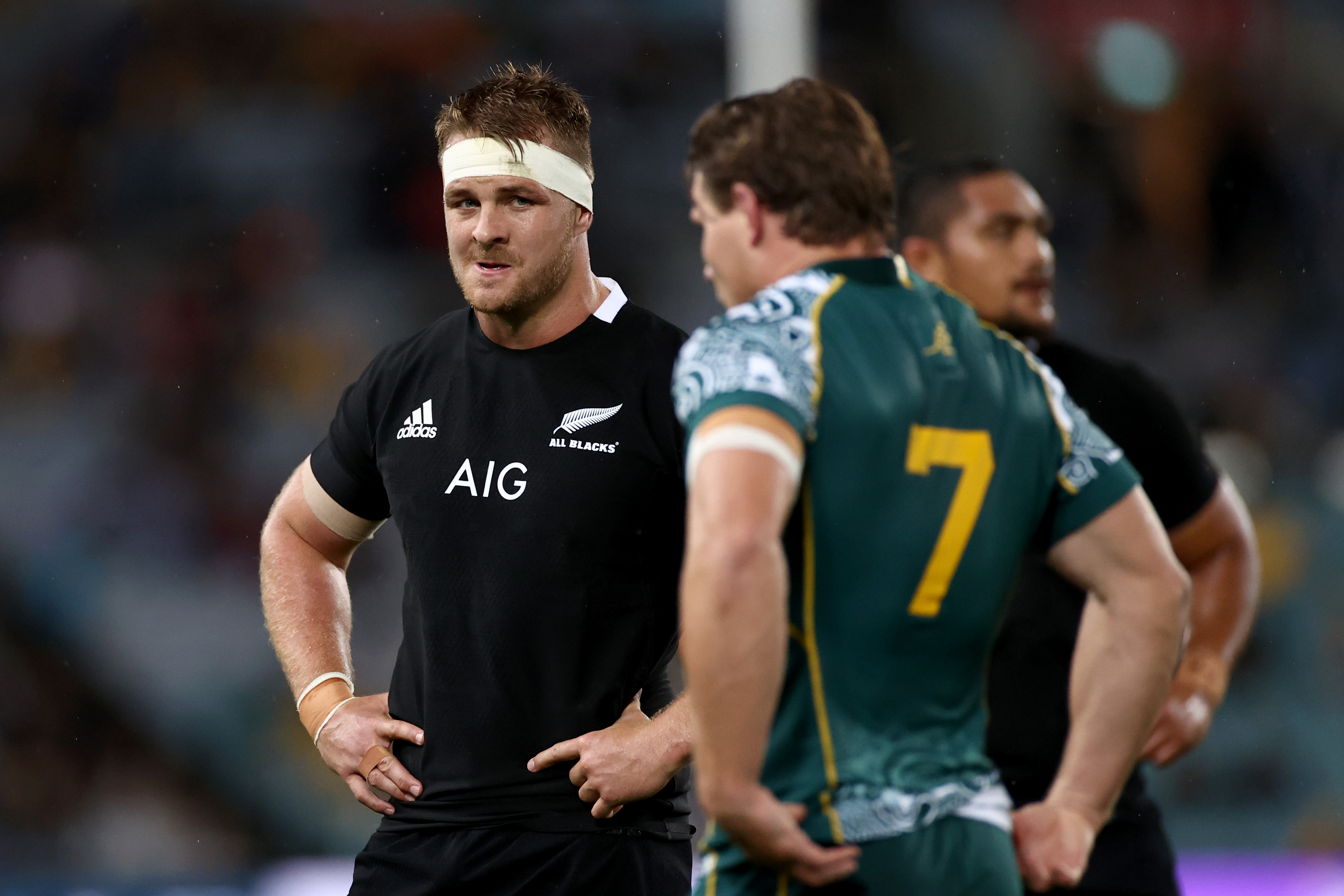 Sam Cane of the All Blacks looks at Michael Hooper of the Wallabies in 2020.