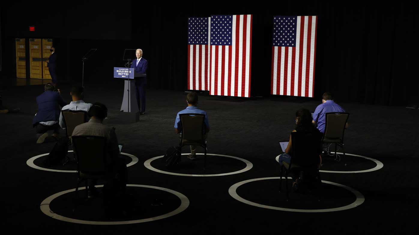 Joe Biden addresses a socially distanced audience.