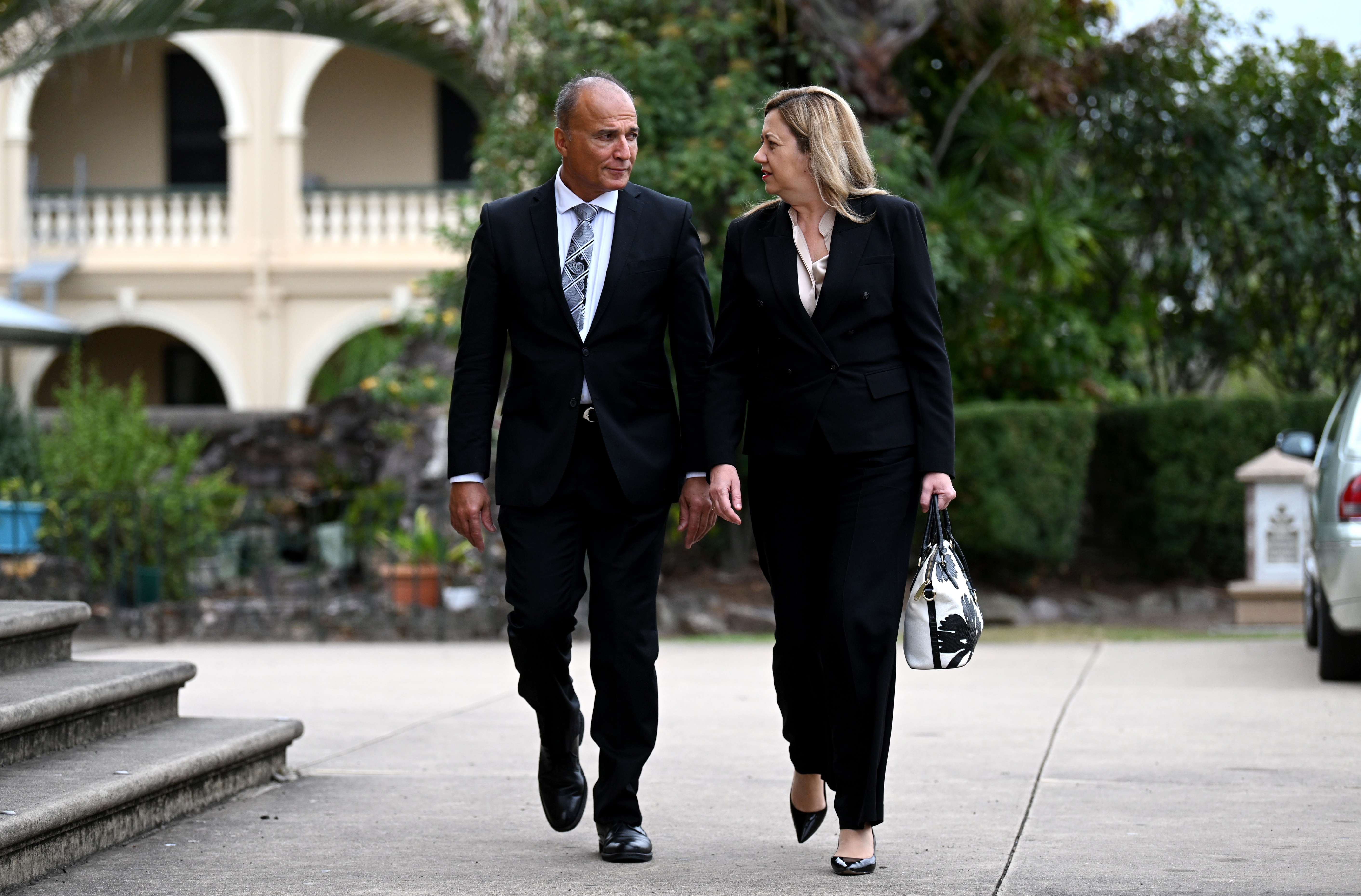 Queensland Premier Annastacia Palaszczuk and her partner Dr Reza Adib arrive for the state funeral for former Governor-General and Labor leader Bill Hayden in Ipswich, west of Brisbane, November 3, 2023.  Picture: Dan Peled