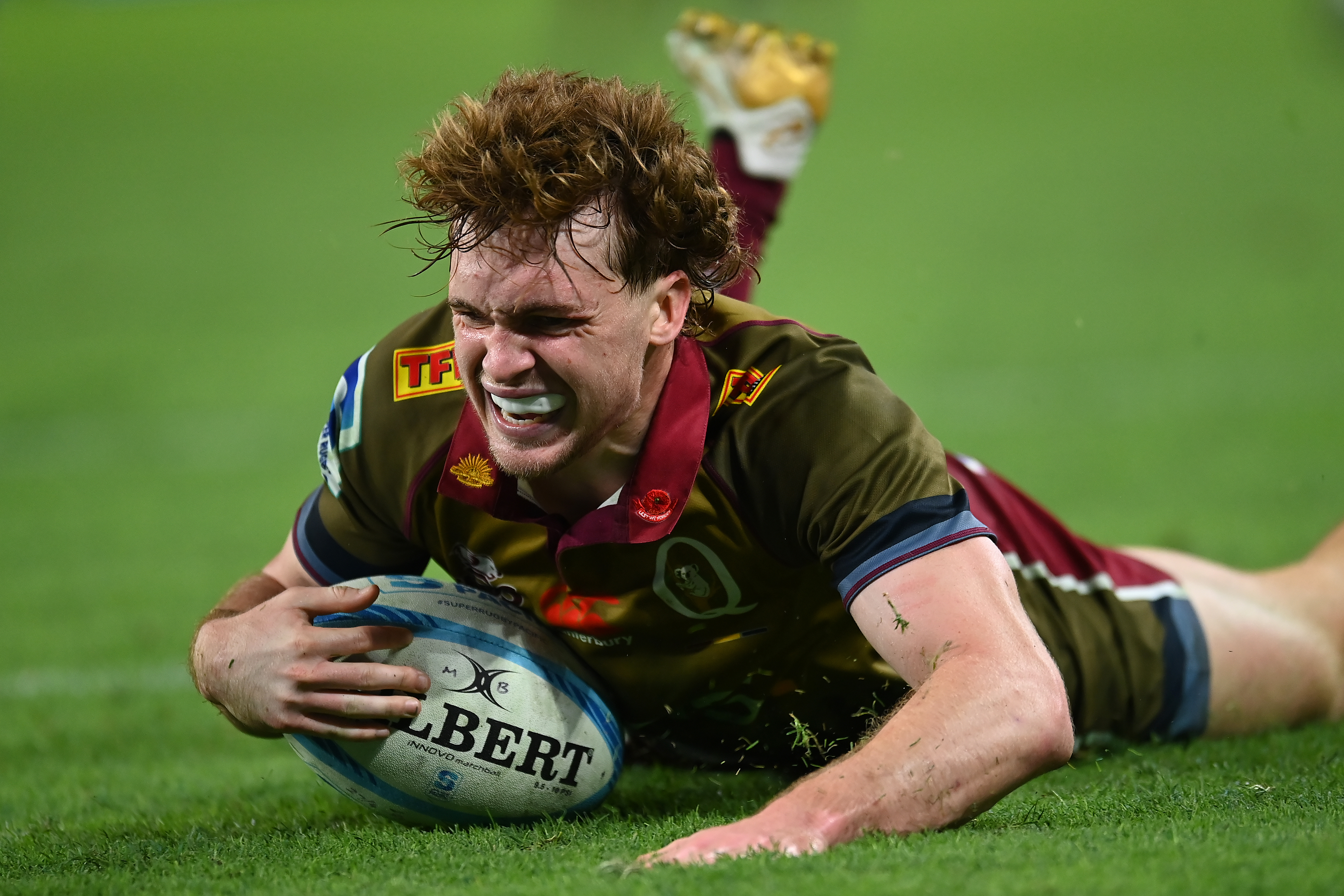 Tim Ryan of the Reds scores a try during the round 10 Super Rugby Pacific match between Queensland Reds and Blues.