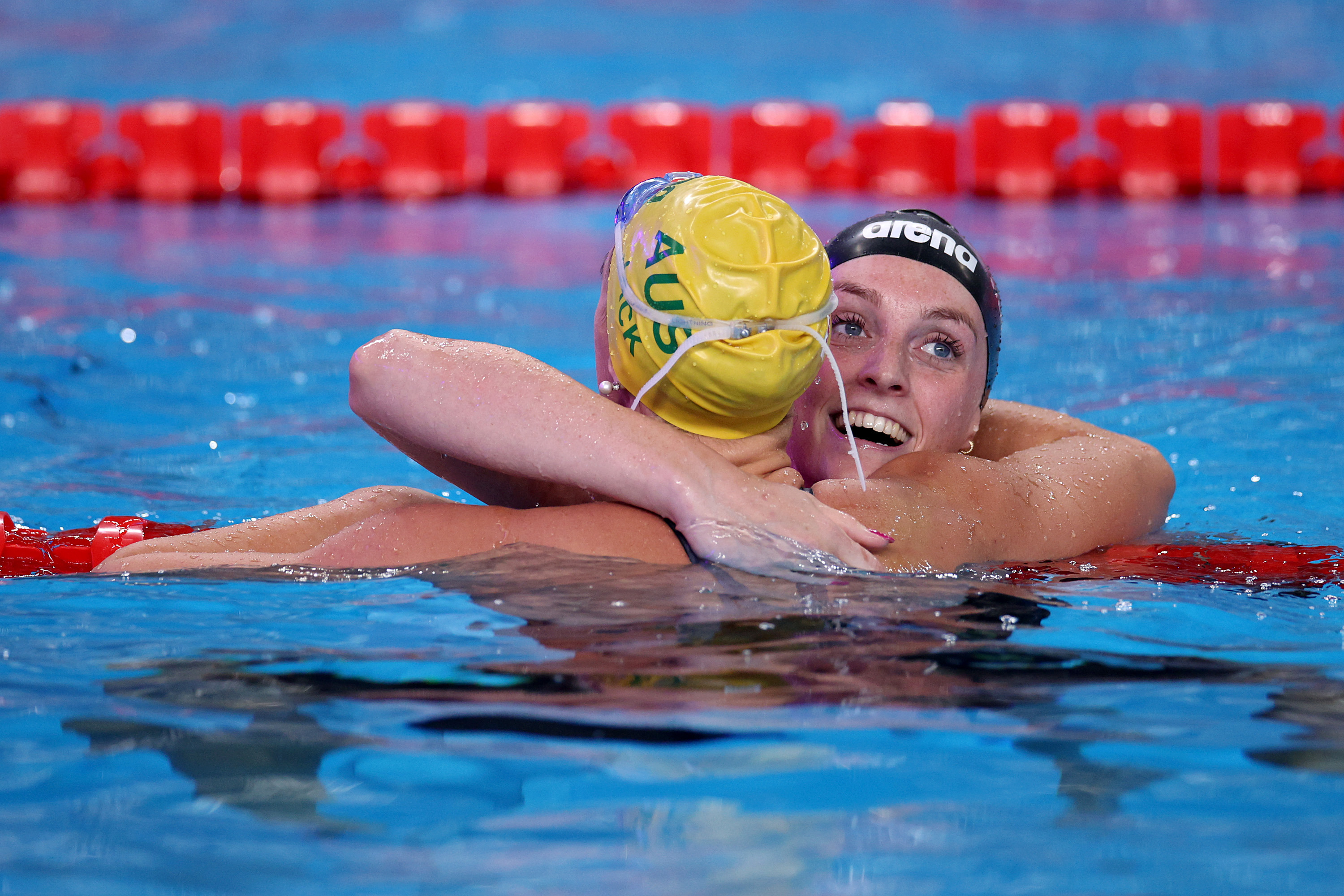 Marrit Steenbergen of Team Netherlands (R) is congratulated by Bronze Medalist, Shayna Jack of Team Australia after winning gold in the Women's 100m Freestlye Final on day fifteen of the Doha 2024 World Aquatics Championships at Aspire Dome on February 16, 2024 in Doha, Qatar. (Photo by Adam Pretty/Getty Images)