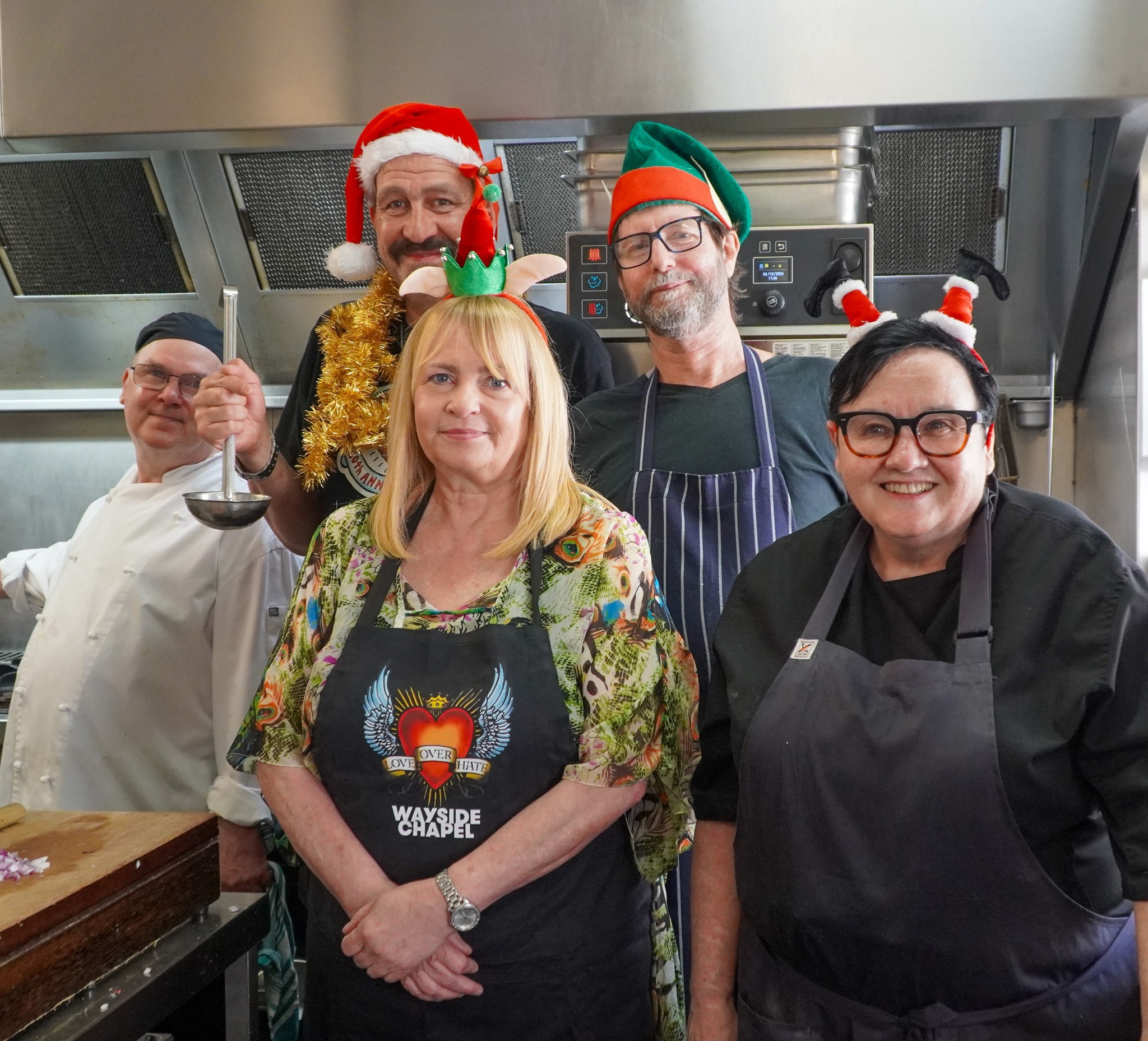 Wayside Chapel's Community Cafe Manager Trish poses with the kitchen's chef